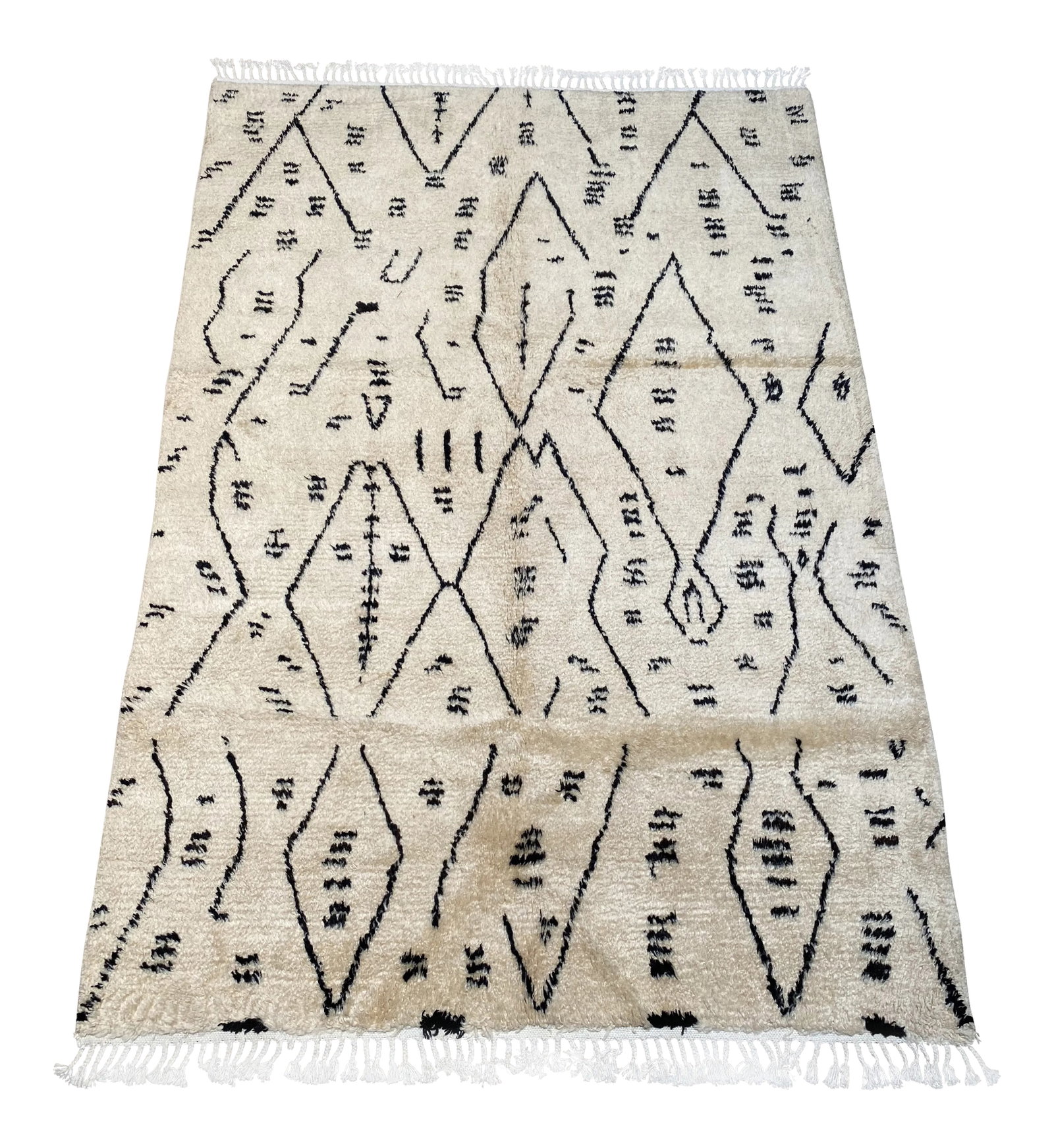 Bellwether Rugs Vintage Moroccan Rug: A lovely vintage Moroccan rug. This vintage Moroccan rug offers a neutral palette with brown accents. Condition: Alterations: Original Condition Unaltered Imperfections: Some Imperfections Condition N