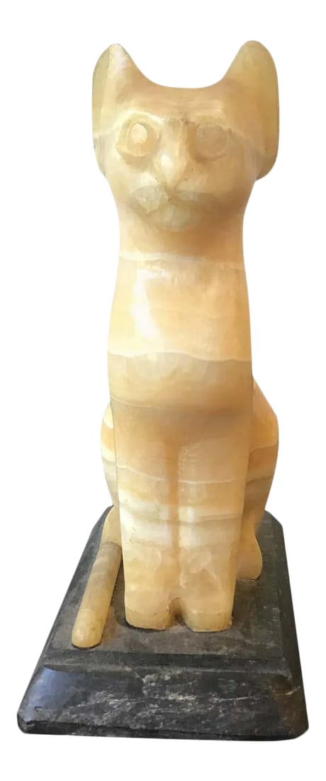 Onyx Cat Sculpture: 1960s carved onyx cat sculpture on marble base. Condition: Alterations: Unknown Imperfections: Some Imperfections Condition Notes: Good Wear consistent with age and use. Materials & Techniques: