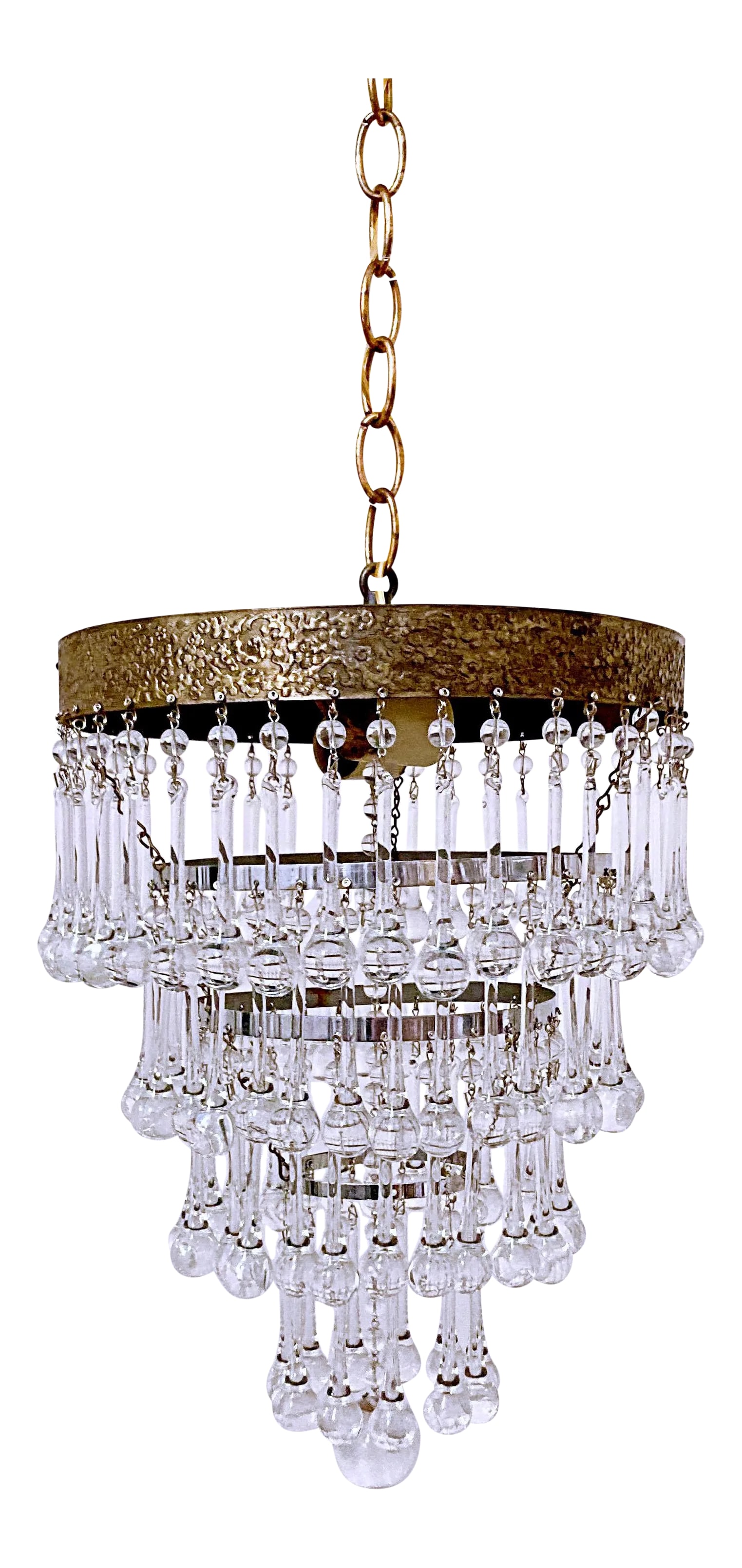 1950's Italian Decorative Brass Rim Upside Down Chandelier: Its an upside down layered cake chandelier with hand blown teardrop crystal and beautiful designed brass rim. It has two Edison based sockets that were rewired. The rim was lightly cleaned to