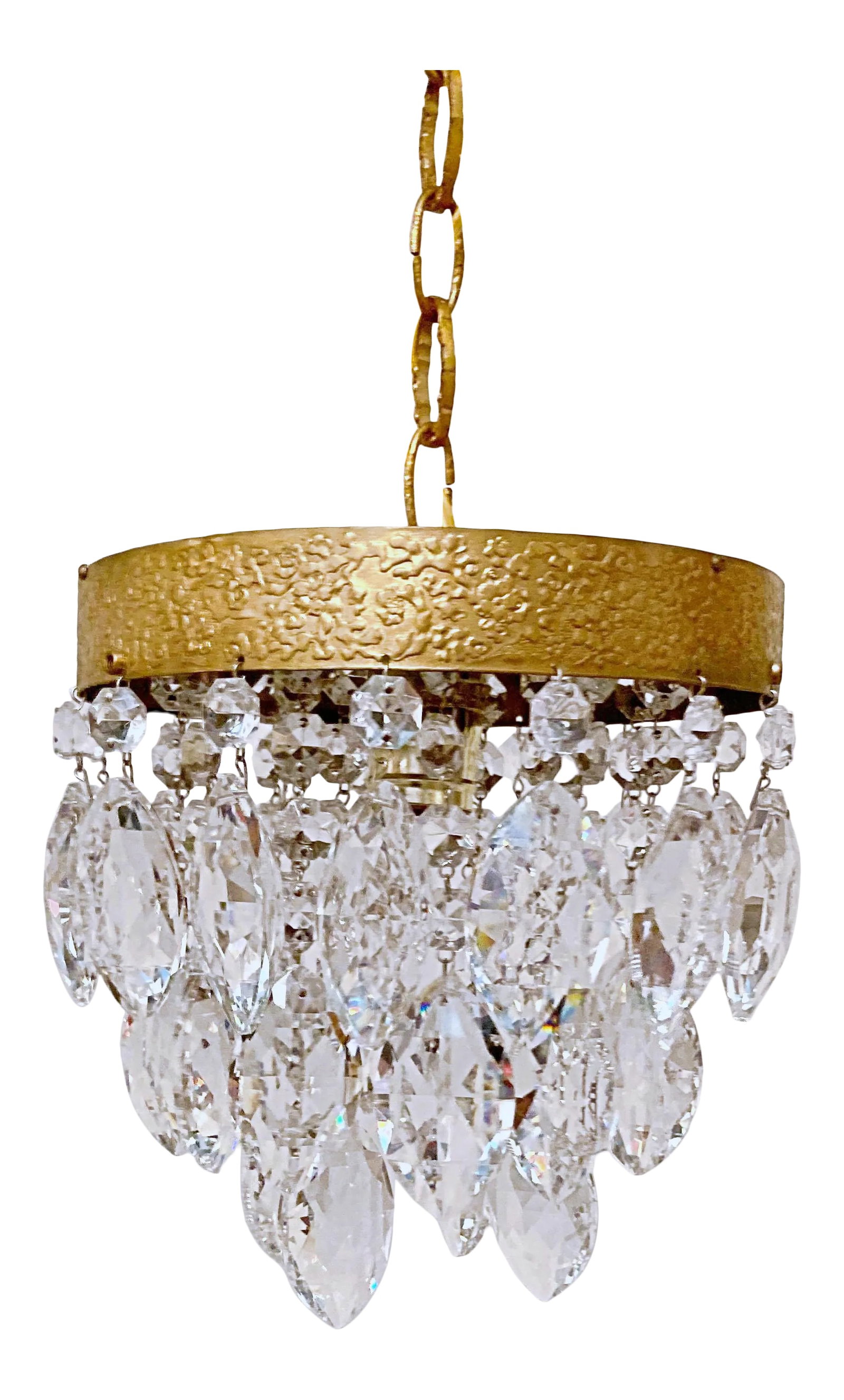 1960s Italian Brass Rim Layered Chandelier: This is a 1960's chandelier with decorative brass rim draped with octagon bead chain and double pint diamond cut crustal drops. It has one Edison based socket that was rewired and all the crystal