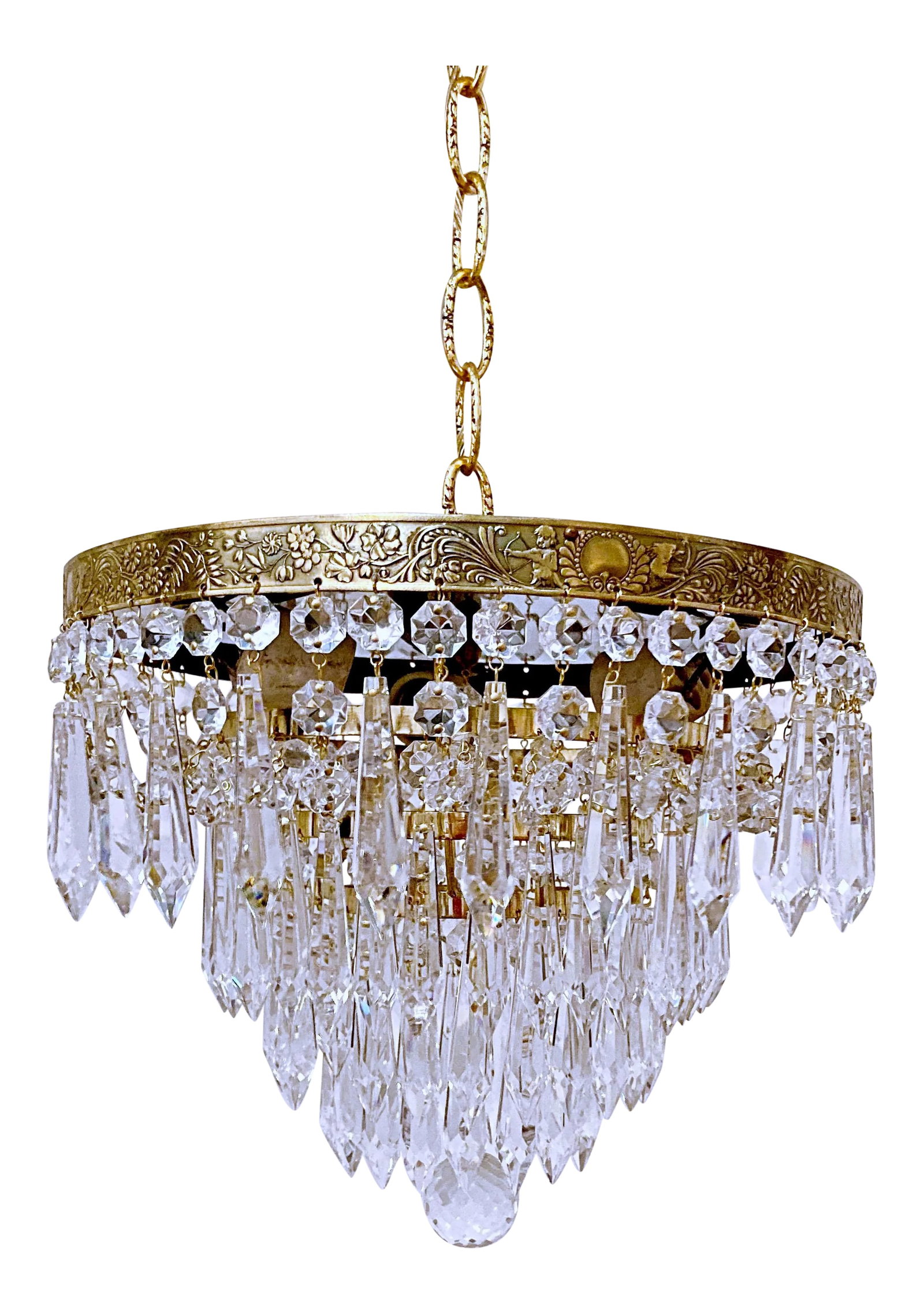 Vintage 1960s Italian Brass Upside Down Layered Cake Chandelier: This is an Italian brass rim chandelier dressed with octagon chain and U-drop crystals drops. It has 3 Edison base sockets. Rewired and restored. it can be either hanged with the chain or converted in