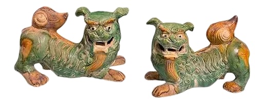 Tang Dynasty Color Fu Dogs - a Pair: Tang Dynasty Color Fu Dog is made out of ceramic. They protect you and push away from evils. It is good accent pieces for decorating. No maker marked. Condition: Imperfections: No Imperfections