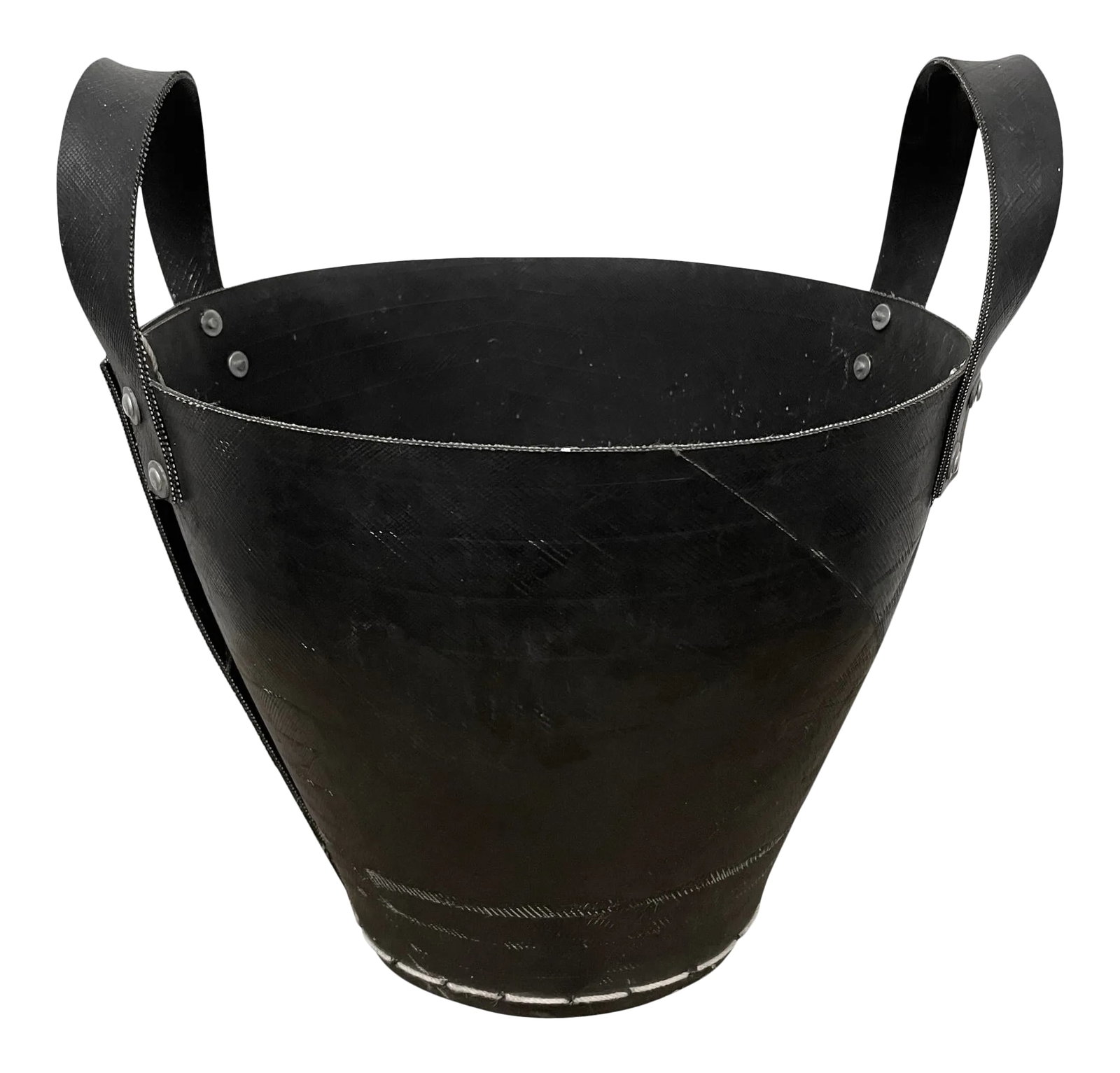 Rubber Tire Bucket: A chic and modern two-handled bucket made from an old rubber tire, sewn with heavy-gauge white string and aluminum rivets. Perfect as your wastepaper basket in your bathroom or next to your desk, or