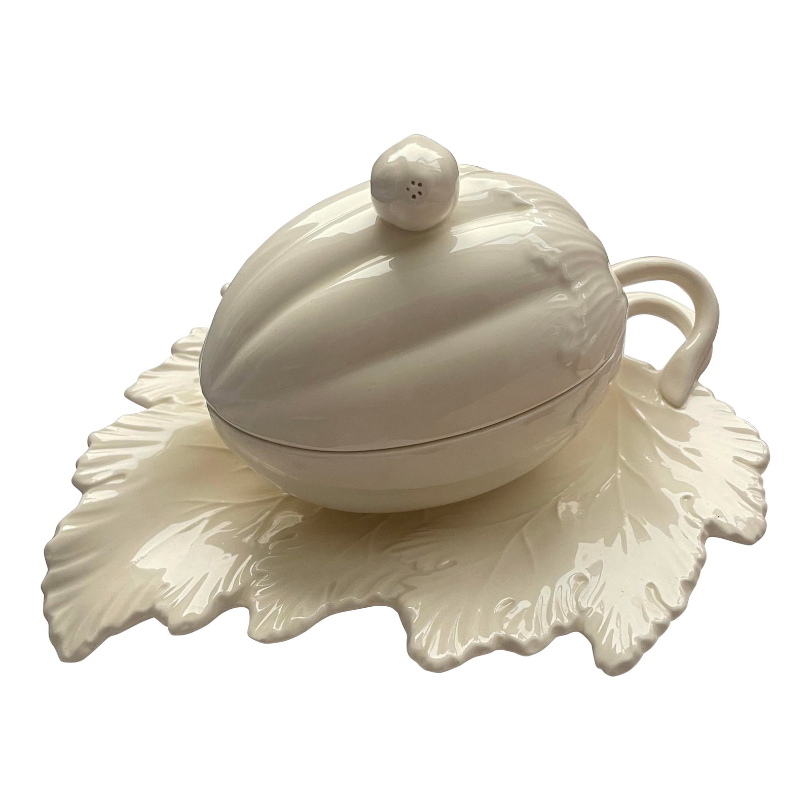 Wedgwood Creamware Small Tureen on Dish: This beautiful small tureen produced by Wedgwood would be fantastic for gravy, sauces or jams for the game table. The base sits securely on a leaf dish while the lid has a gourd as its pull.