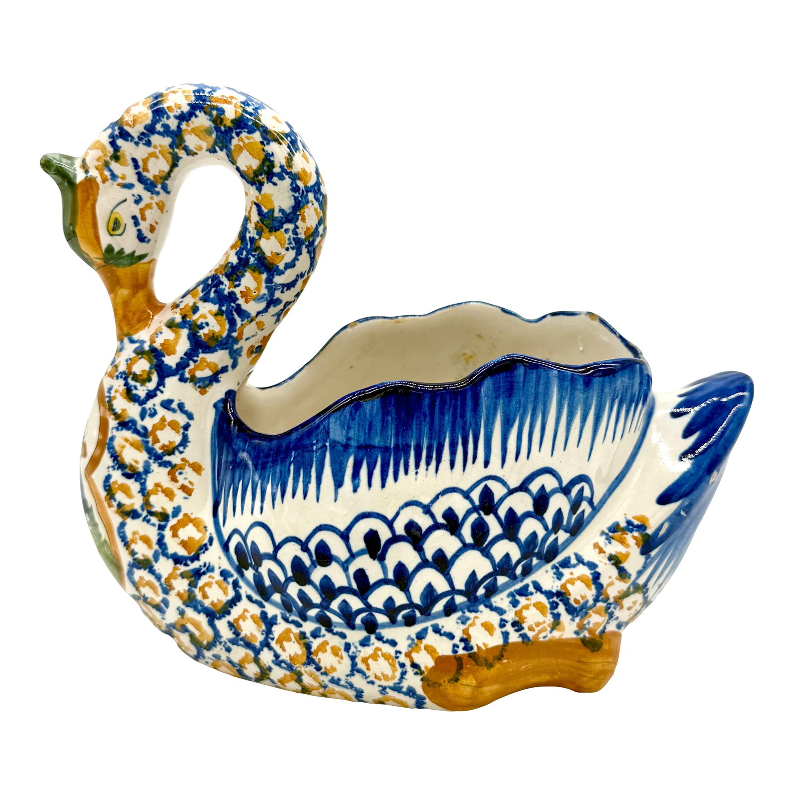Antique Quimper Hand Painted Swan Jardiniere: Early 20th-Century French Quimper swan cachepot or planter. It is hand painted with a foliate pattern, featuring a traditional Breton man playing an instrument on the swan's chest. This lovely