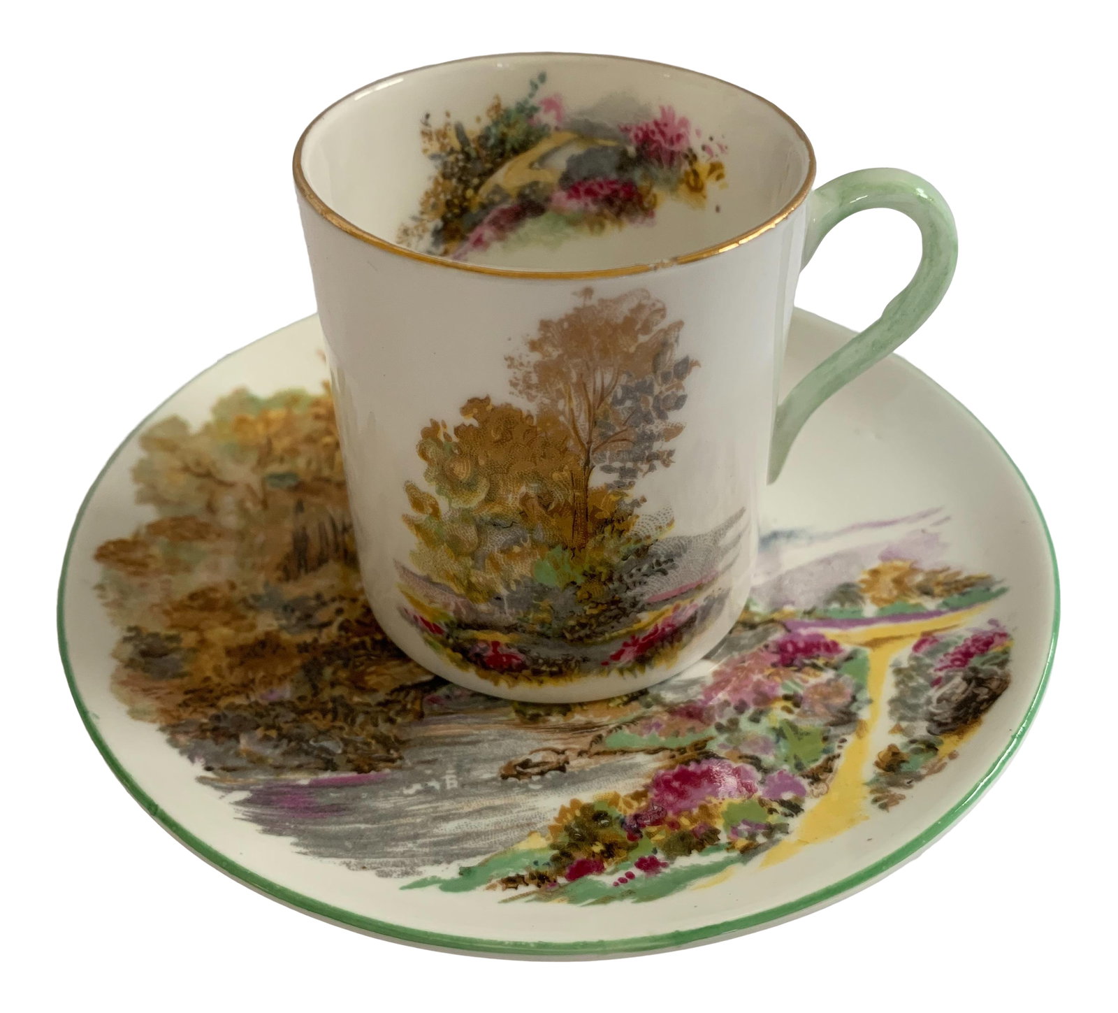 1960s Shelley English Heather Tea Cup and Saucer - 2 Pieces: Shelley English Bone China Heather tea cup with matching saucer circa 1962-1963. The tea cup pattern features a wooded scene with pink flowers in front and tall amber trees. The inside of the tea cup 