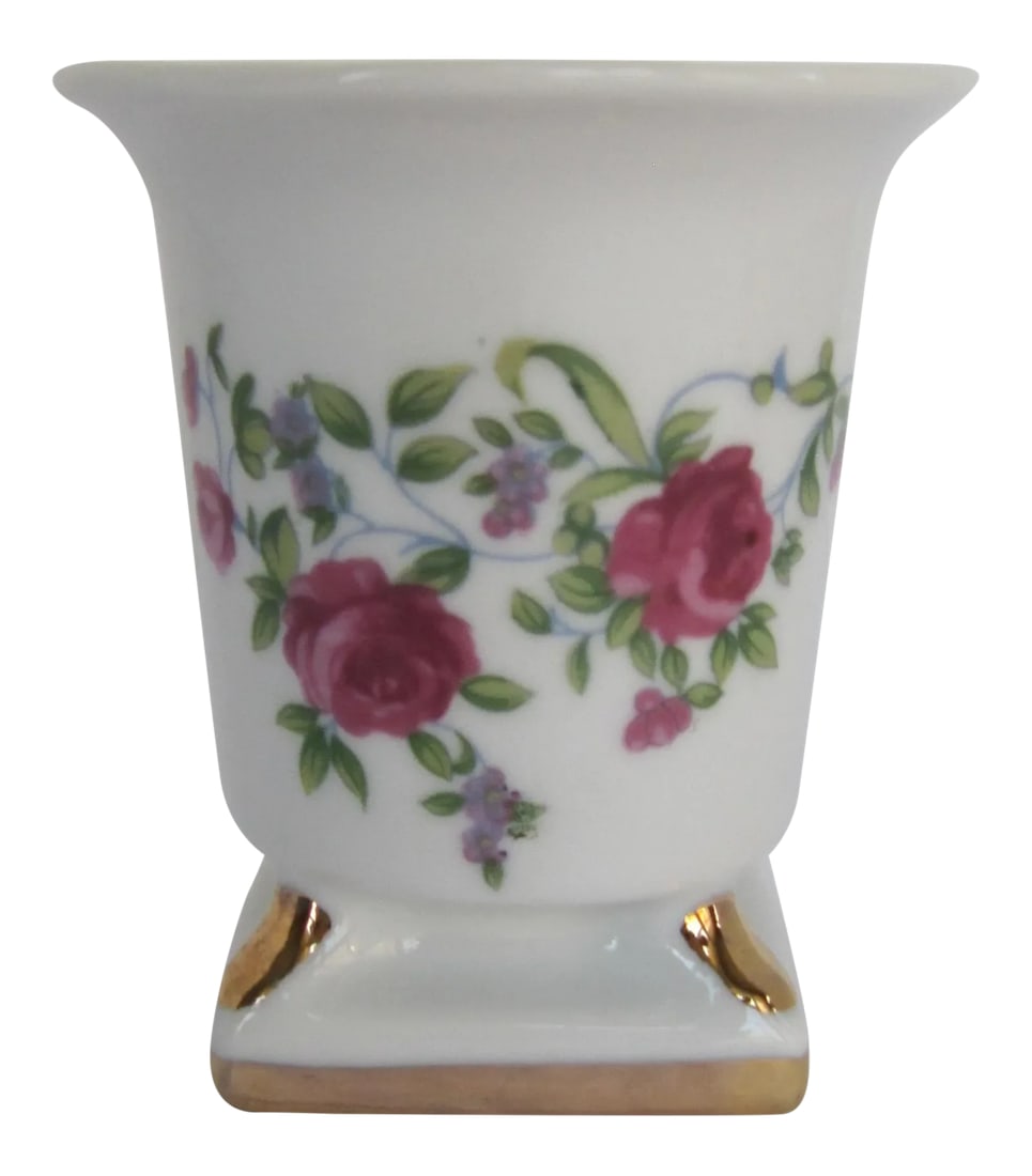 White Porcelain Urn With Roses: Small white porcelain urn with flowers. Could be used as a pencil cup or a container for small items. Combined shipping available. Condition: Alterations: Original Condition Unaltered Imperfections: