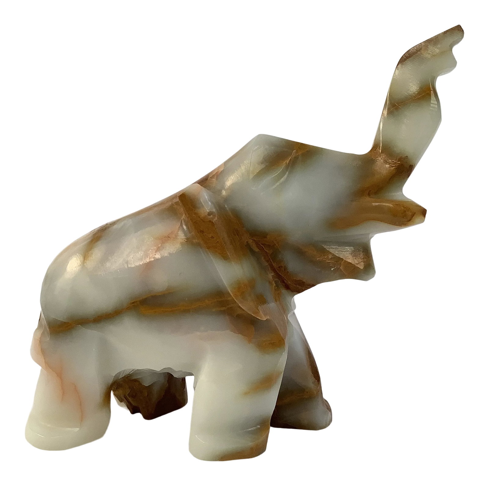 Vintage 1970s Hand Carved Onyx Elephant: This unique onyx hand carved elephant would work well as a bookend. It can also be a statement in a grouping of accessories. The veining is very distinctive. Condition: Alterations: Original Condition