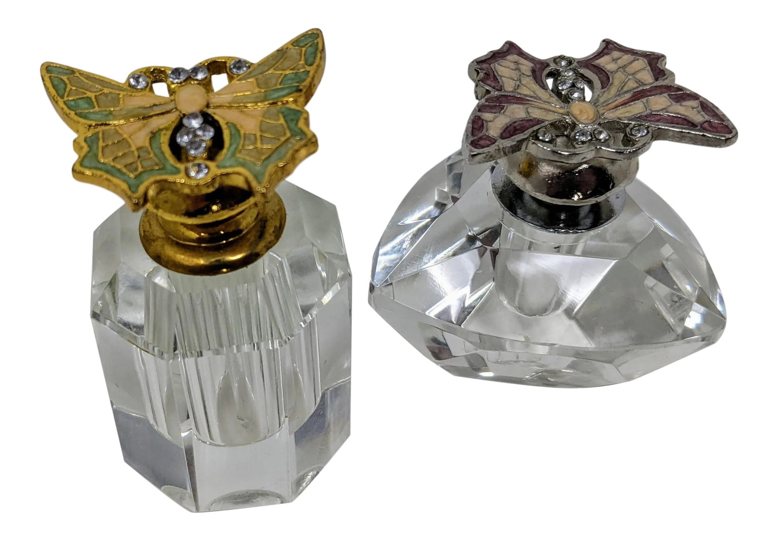 Regency Vintage Crystal Perfume Bottles With Glass Applicators - Set of Two: These crystal jeweled perfume bottles would be perfect for someone who loves butterflies or as a perfect way to add a little sparkle on a shelf, vanity, or bathroom. Butterflies are in a purple hue