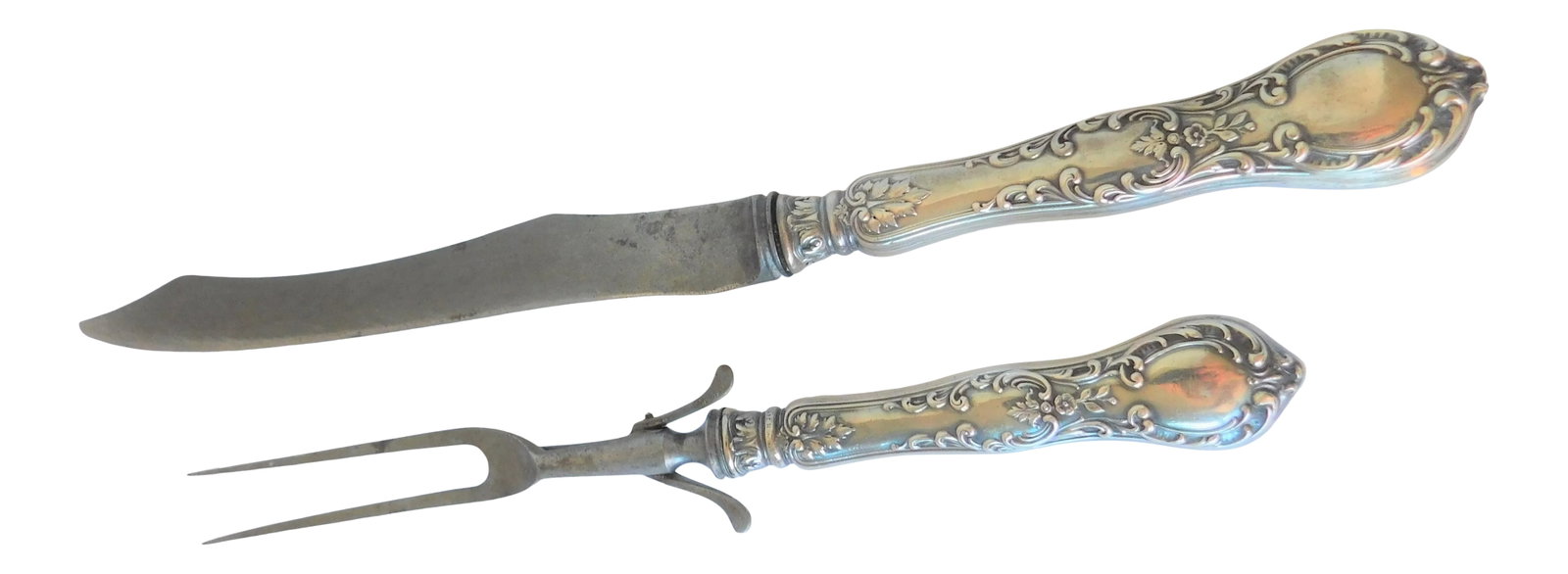 Vintage Preisner Sterling Silver Carving Knife & Fork Set- 2 Pieces: This Preisner Sterling Silver Carving Knife and Fork Set, C. 1940's -1950's, was made in Wallingford, Ct. The knife measures 14.50 inches long x 1.25 inches wide x .50 inches deep. The fork, which has