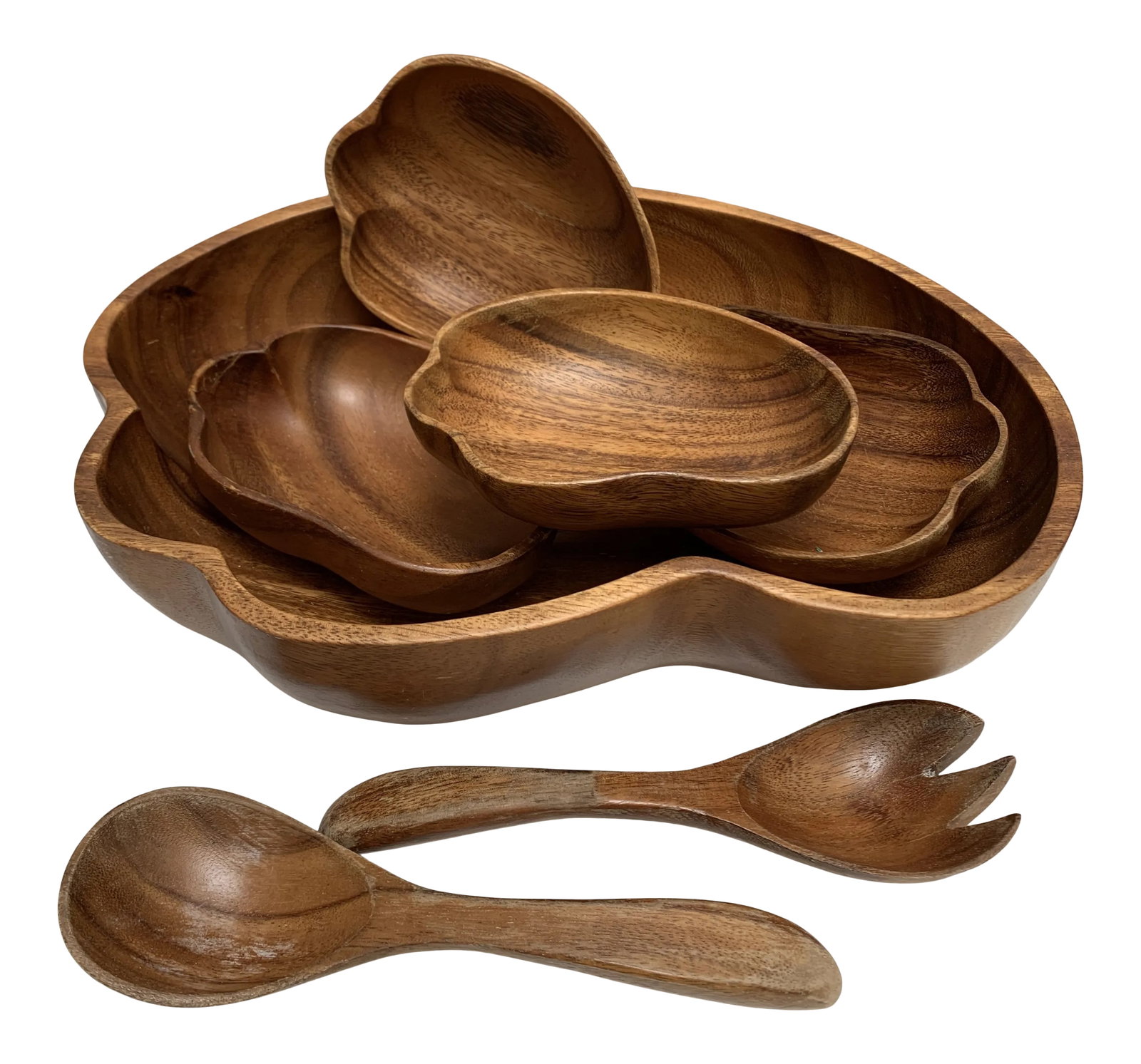 Set of Seven Midcentury Hawaiian Monkeypod Wood Bowls: Vintage Midcentury Hawaiian wood bowls and serving utensils. Seven pieces total in this set of hand carved monkey pod natural wood bowls. The smaller bowls are 7x6" and the larger bowl is listed in