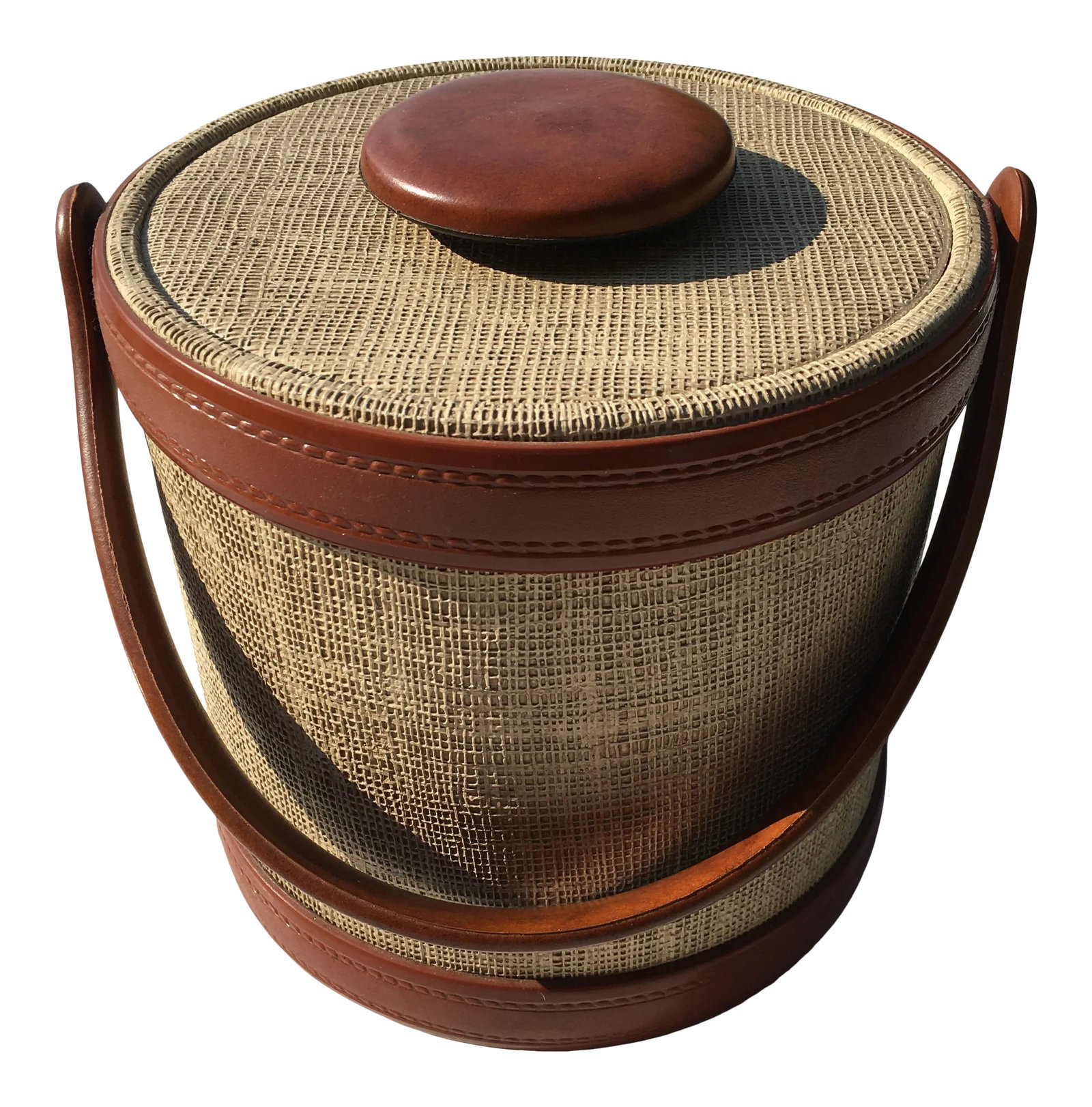 1990s Kraftware Modern-Style Ice Bucket: This ice bucket was made in New York by Kraftware. The casually elegant style was achieved by Incorporating faux leather &faux grasscloth These materials are really easy maintenance Diameter 8 inches 