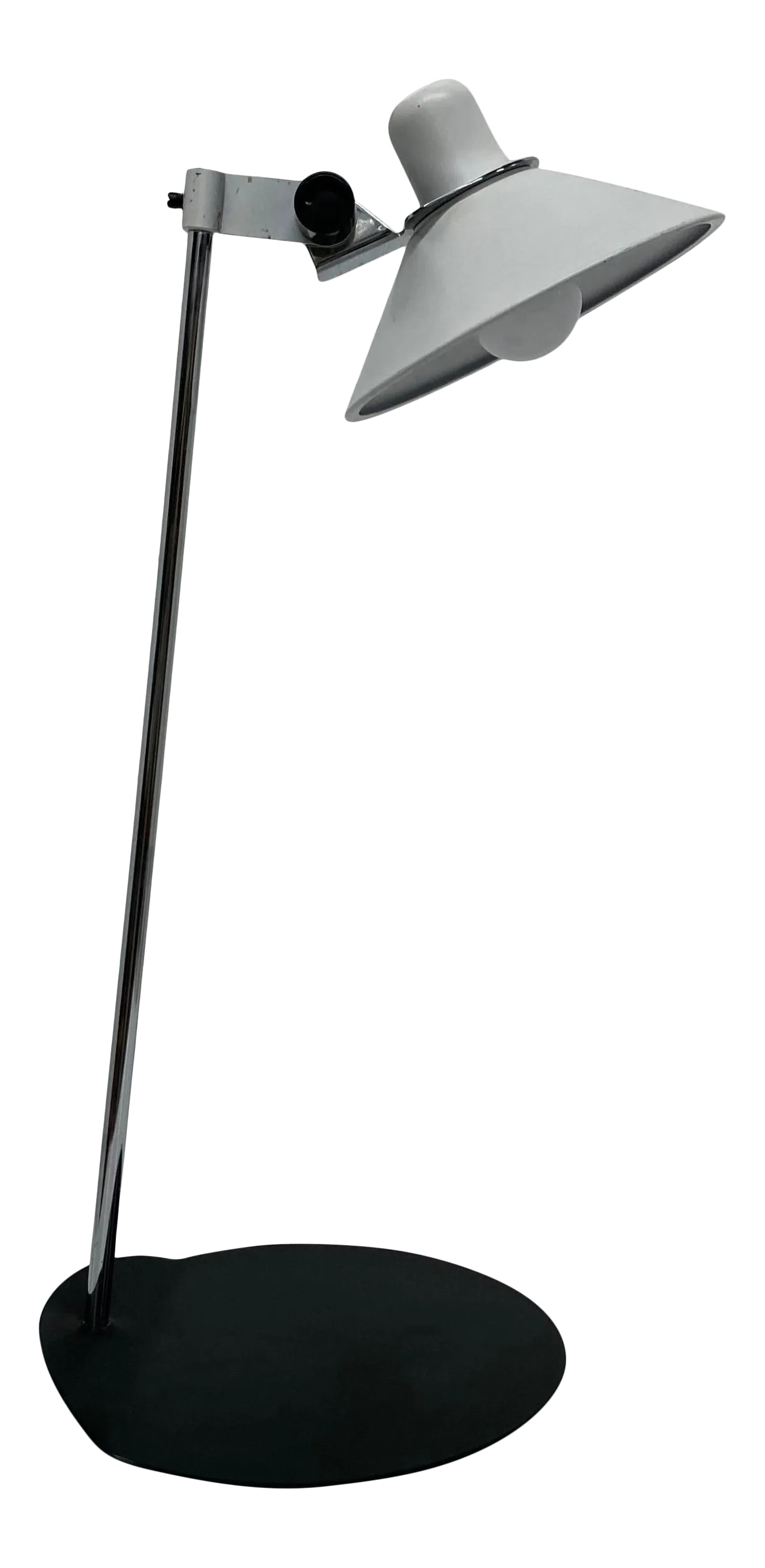 Black and White Postmodern Lamp: Postmodern lamp with white enameled shade supported by a chrome stem and mounted on a black steel base. The shade tilts back and forth. Not height adjustable. Condition: Alterations: Original Conditio