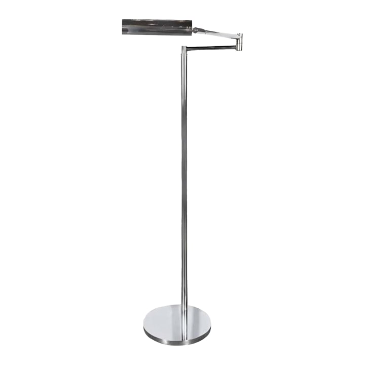 1970s Bauhaus Koch & Lowy Chrome Pharmacy Adjustable Floor Lamp: Vintage pharmacy style floor lamp made by Koch & Lowy, circa 1970's. The lamp features an adjustable vertical center pole, which raises from 42" to 53", the horizontal arm rotates on the vertical pole