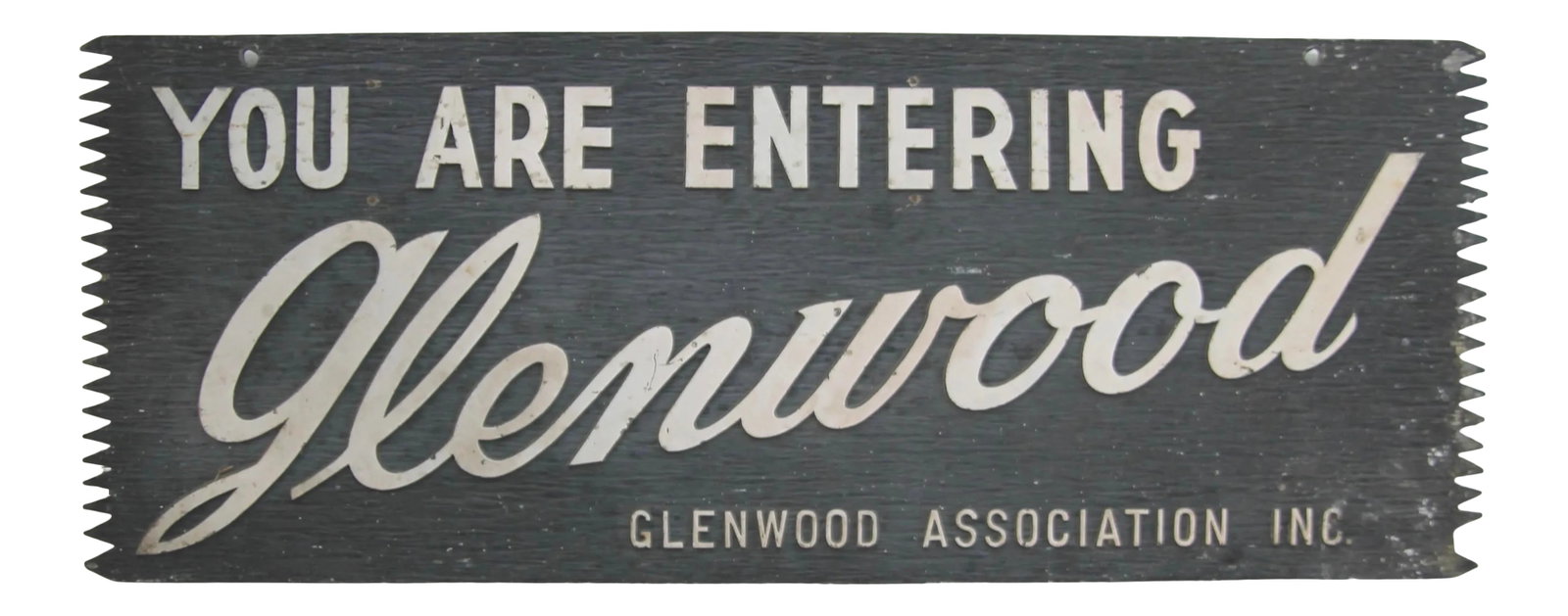You Are Entering/Leaving Glenwood Metal Sign: Circa 1950s black with off white raised lettering cast aluminum two sided Glenwood sign with saw tooth ends. Sign has discolorations, paint loss, scratches, holes where once attached. Condition: