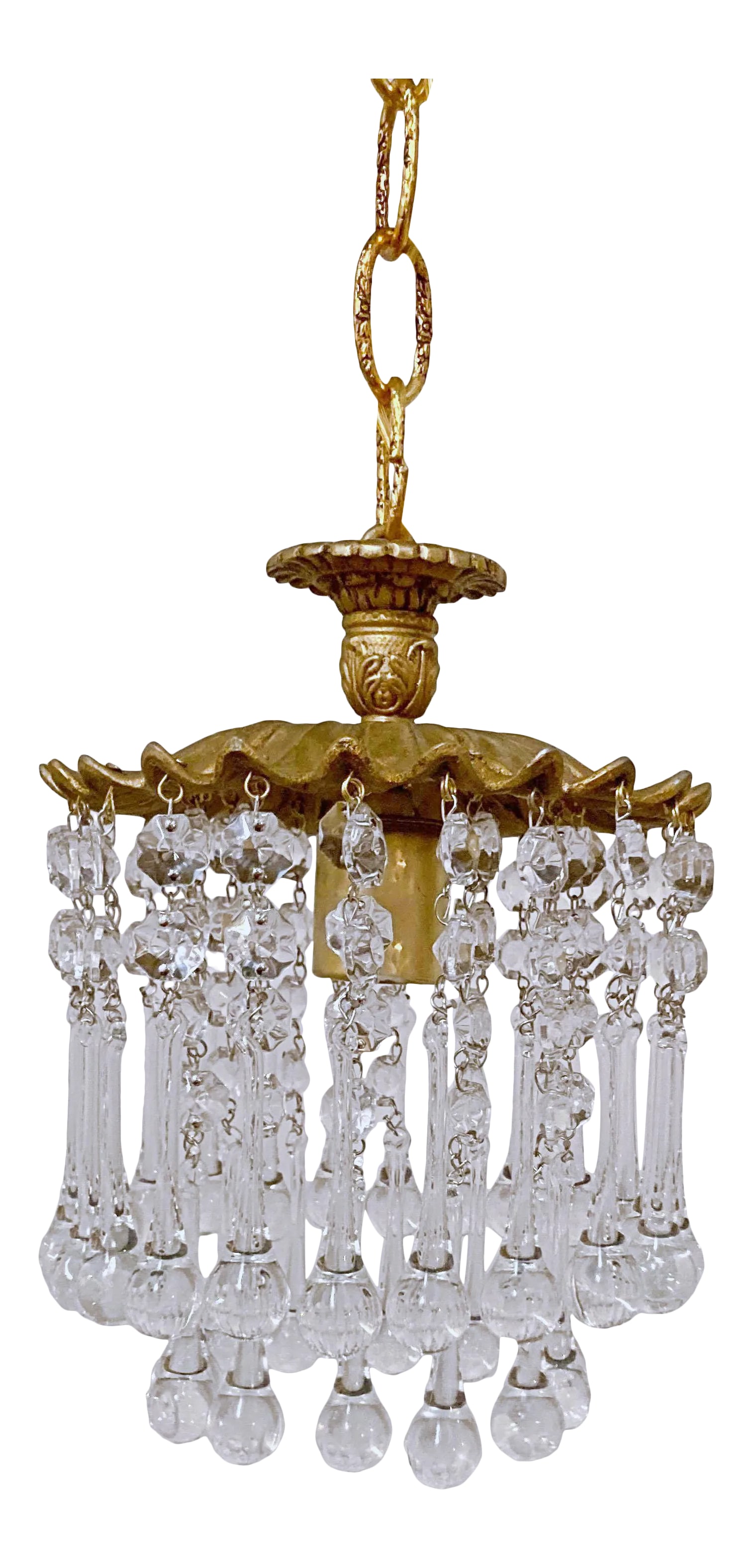 Italian Brass Upside Down Layered Cake Chandelier: Italian layered chandelier with Brass rim, octagon bead chains and 30% leaded Teardrop crystals. It has 1 Edison base socket that each can hold up to 100W each. Rewired and restored. #226 Condition: A