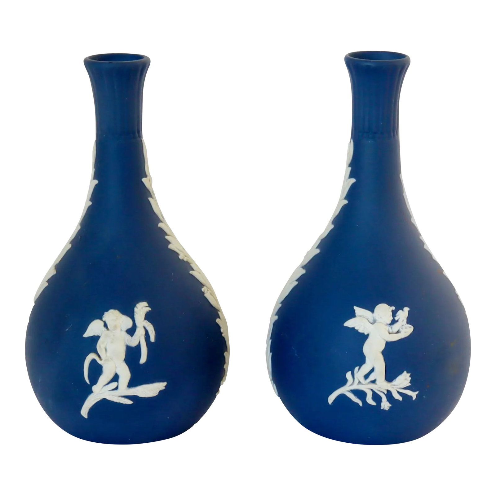 1970s Wedgwood Jasperware Bud Vases, a Pair: A pair of 1970s Wedgwood jasperware bud vases in deep cobalt blue, each decorated with crisp white neoclassical relief figures and foliate detailing. Slender in form and balanced in scale, these