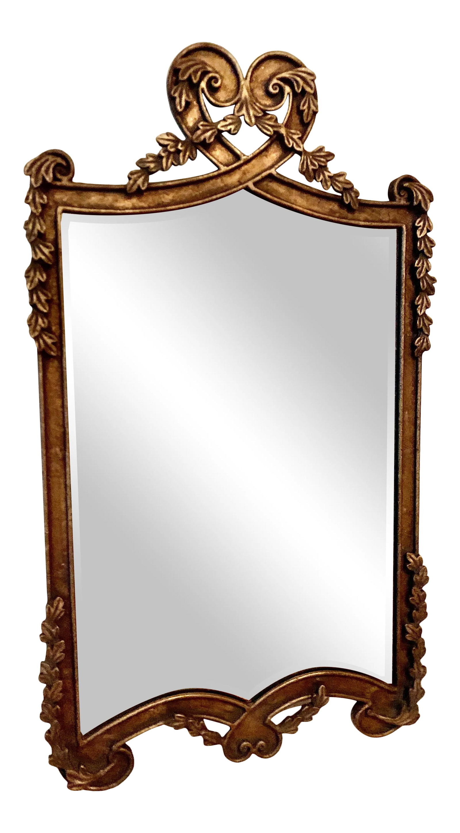 Vintage Gilt Mirror With Beveled Glass: Beautiful vintage ornate metal and composite gilt mirror with beveled glass and aged brass patina. Scroll and leaf detail throughout. No scratches to the mirror. In very nice condition. Heavy.