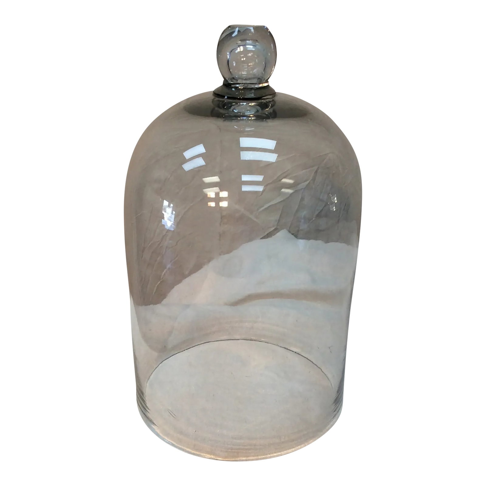 1800s French Glass Dome, Cloche With Solid Glass Knob Handle: Found in the South of France, this 19th century glass dome or cloche has a solid glass knob handle. Made of blown glass, these were used in French patisserie shop's to cover and display pastries. The 