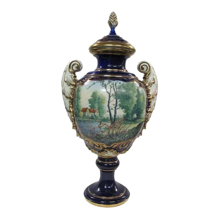 Sevres Style Cobalt Blue And White Urn: Cobalt blue and white urn. Sevres style. H: 23" x Base: 6" Condition: Alterations: Unknown Imperfections: Some Imperfections Condition Notes: wonderful condition Materials & Techniques: Porcelain