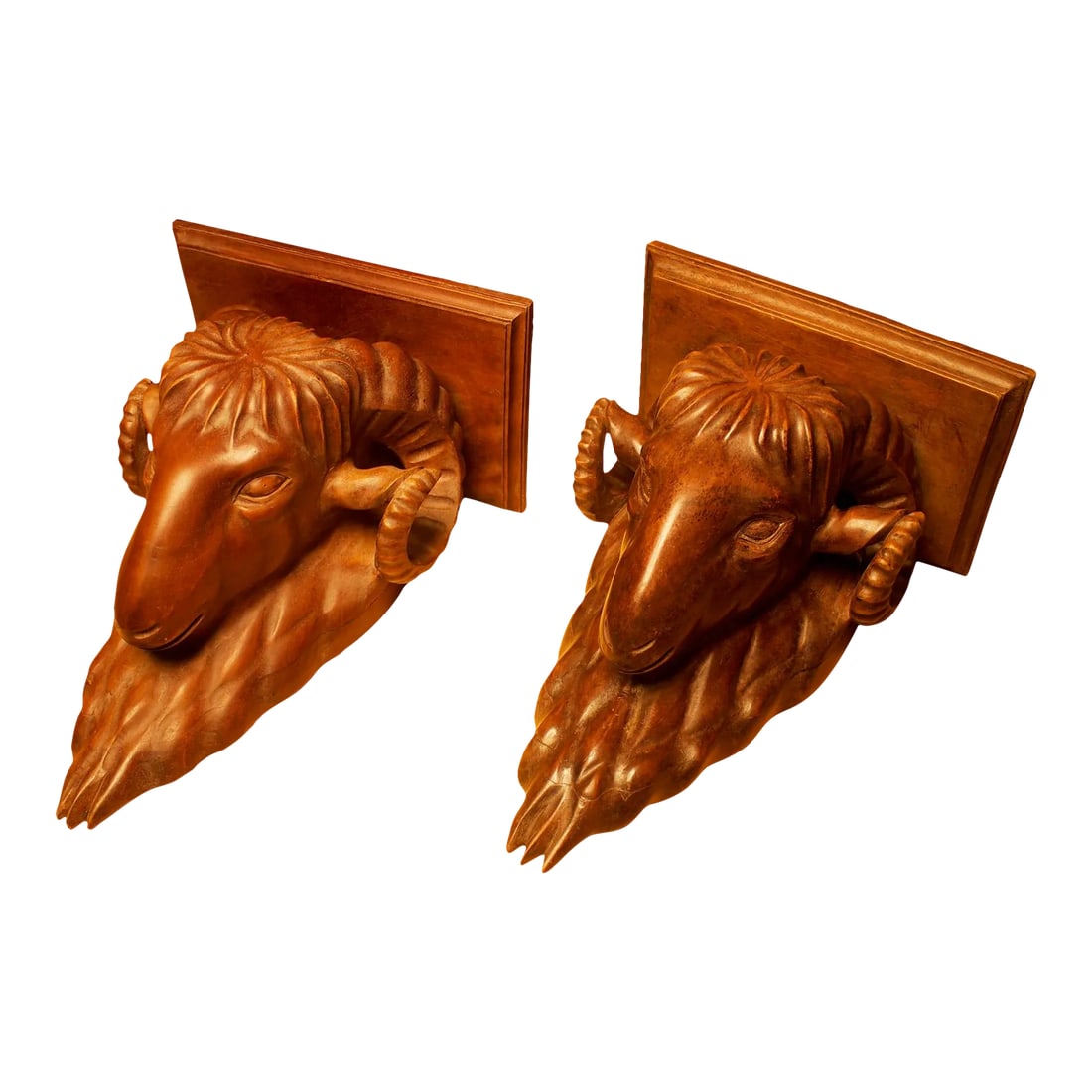 Antique Black Forest Ram Head Carved Wall Shelves- a Pair: Incredible pair of late 19th century Swiss Black Forest carved ram's head wall/clock shelves. Heavy solid walnut, with the only apology being slight age separation, appearing on both shelves, where