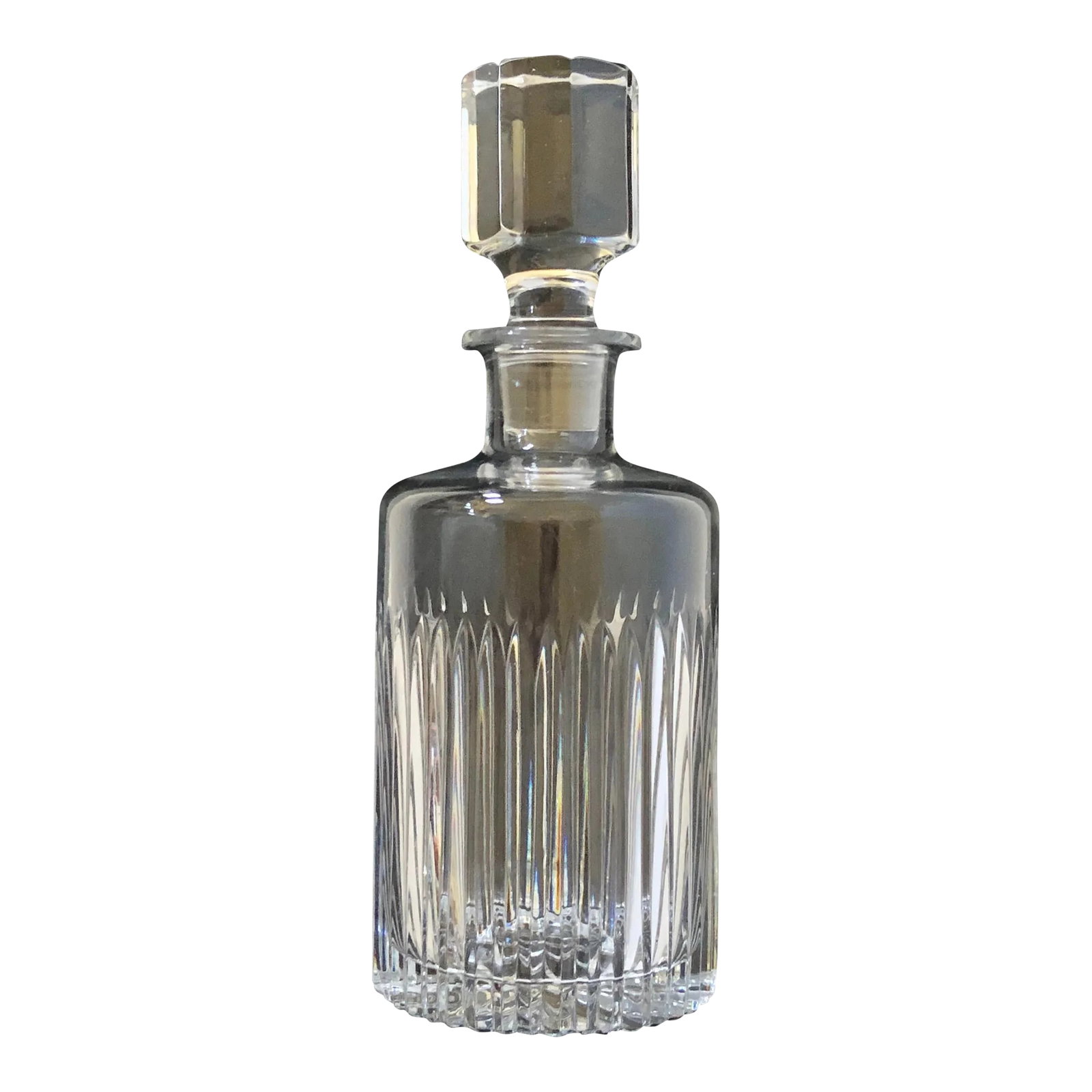 Mid Century Cut Crystal Liquor Decanter: Smaller in scale for your most cherished liquors yet still an elegant vessel. Star burst bottom radiates up the sides of this lovely decanter. Octagon cut stopper tops off the piece. A fitting vessel