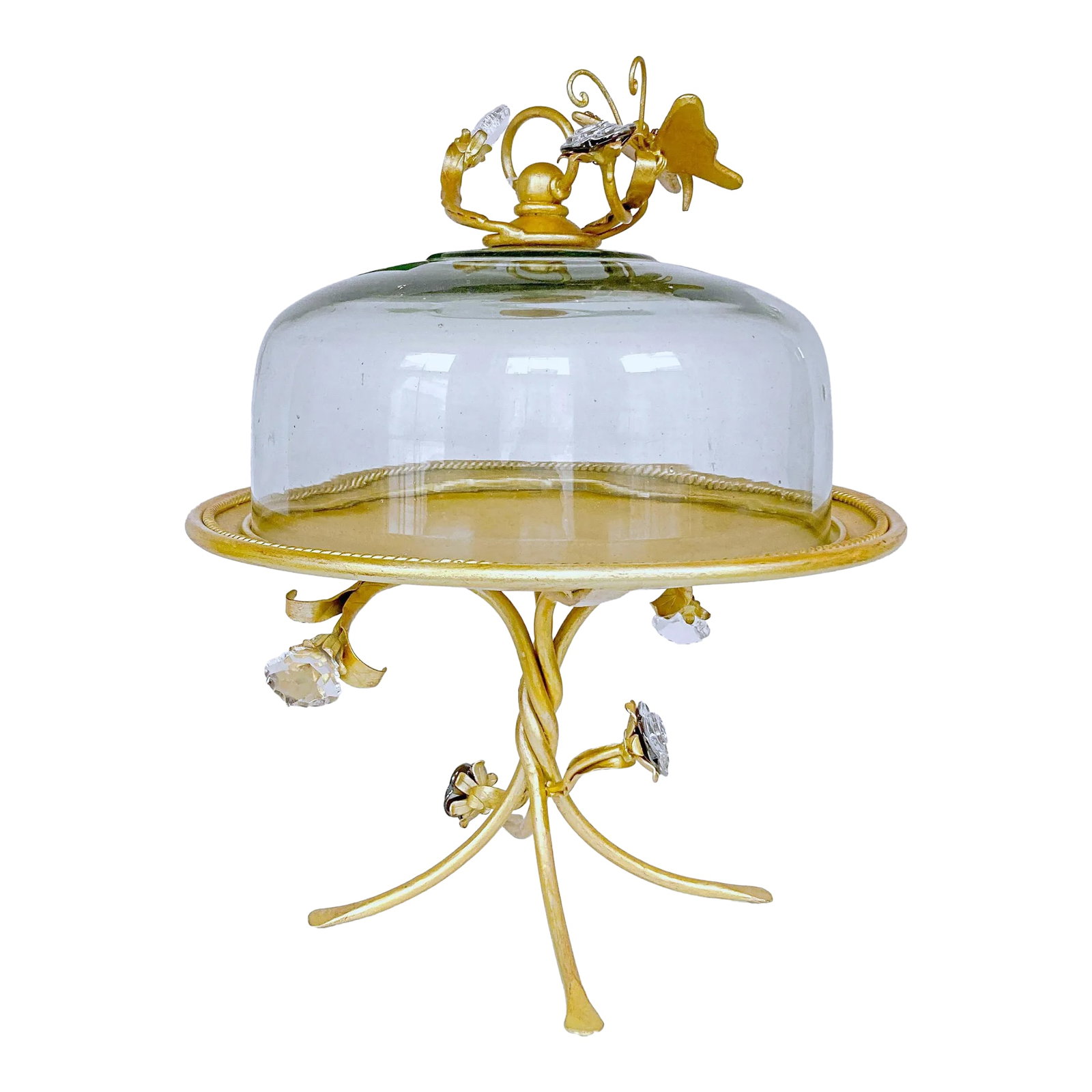 1990s Decorative Golden Iron Cake Stand With Glass Dome and Crystal Accents: This is decorative Iron cake stand with hand blown glass dome. The iron stand is painted in gold finish and decorated with hand made glass flowers and crystal prisms. The dome is hand blown and