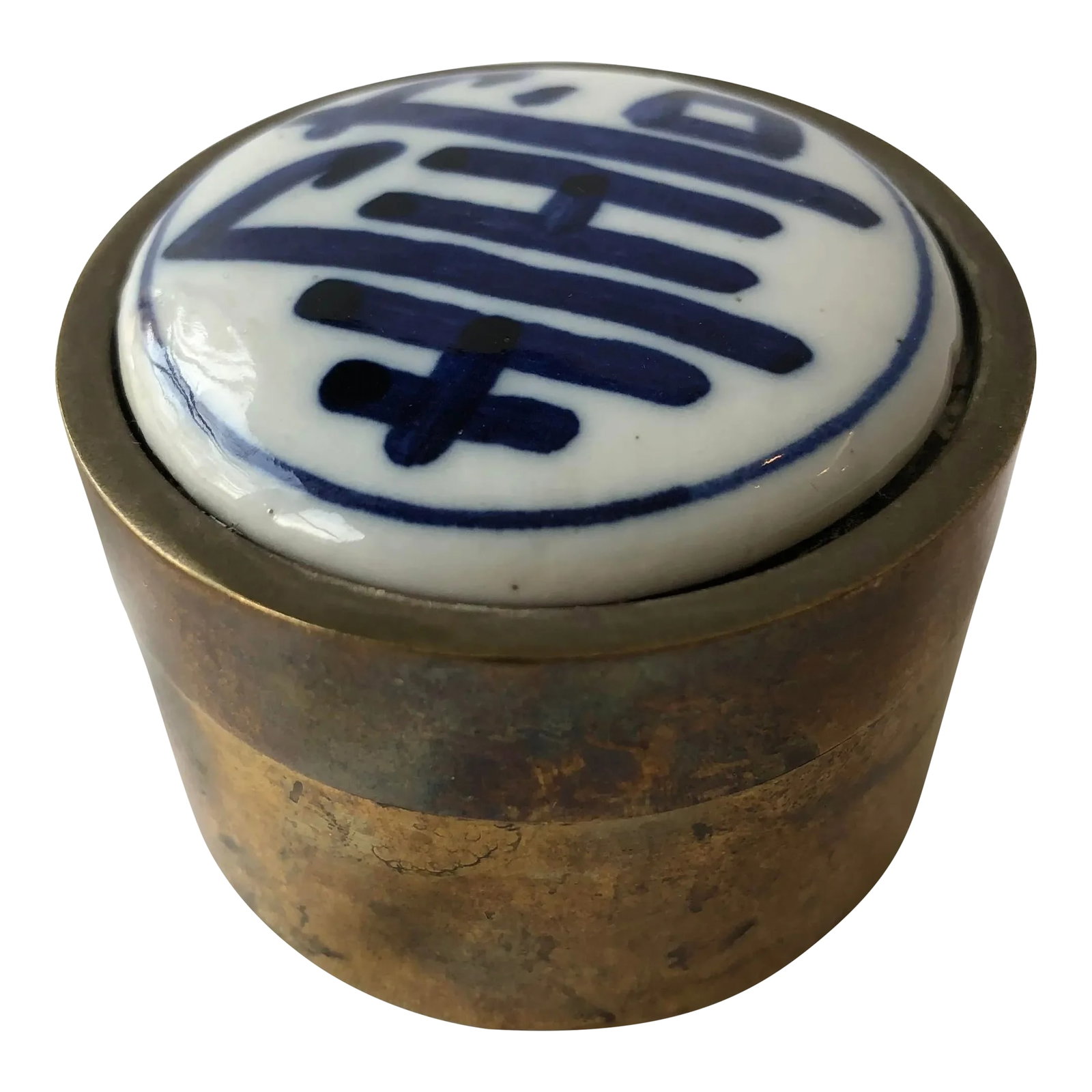 Mid 20th Century Porcelain and Brass Asian Trinket Box: Vintage brass trinket box with a hand-painted, white porcelain lid and blue character. Condition: Alterations: Original Condition Unaltered Imperfections: Some Imperfections Condition Notes: Brass oxi