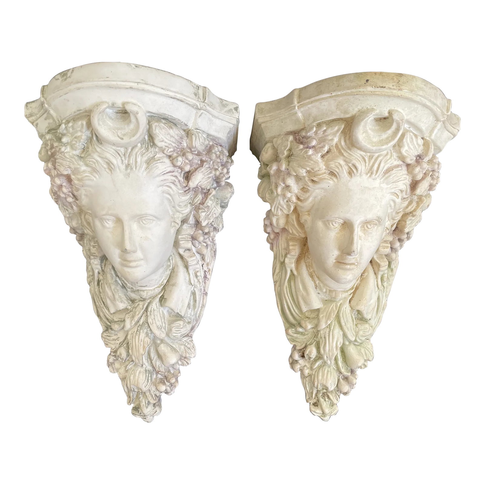 Vintage Italian Neoclassical Maiden Plaster Corbels Wall Brackets - a Pair: A pair of vintage Italian Neoclassical maiden plaster corbels - wall brackets with a flat top. I believe they have been decorated with light green, pink, and purple paints, and the two corbels have