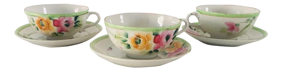 Antique Hand Painted Porcelain Floral Tea Cups & Saucers - Service for 3: Antique set of three ,fine porcelain, hand painted with soft colors floral tea cups and saucer, no makers mark in very good condition. Condition: Alterations: Original Condition Unaltered Imperfection