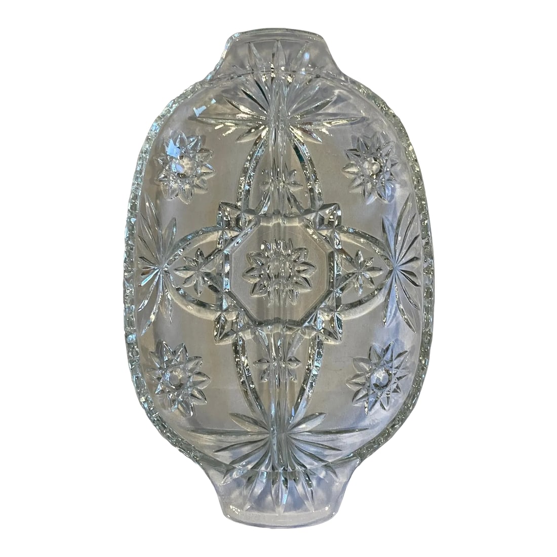 1950s Vintage Cut Glass Starburst Divided Serving or Candy Dish: Vintage Pressed Cut Glass Clear Oval Divided Starburst Serving Candy Relish Dish. Excellent used condition. No chips or cracks. Starburst pattern cut/pressed from underneath. Dish is divided lengthwis