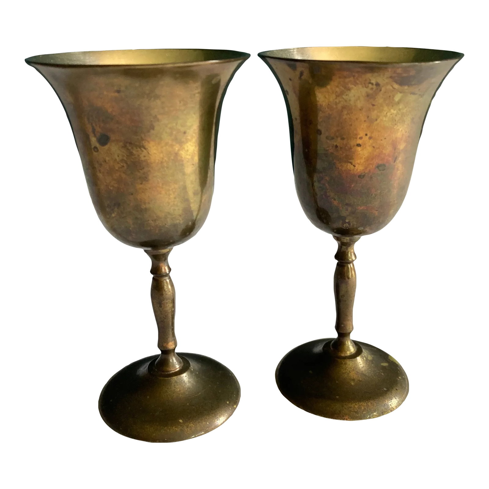 Vintage Sarna Brass Goblets- Set of 2: This matched pair of Sarna brass goblets represents fine Indian metalwork and exemplifies the beauty found in authentic vintage finds. Each solid brass piece features a graceful tulip-shaped cup with