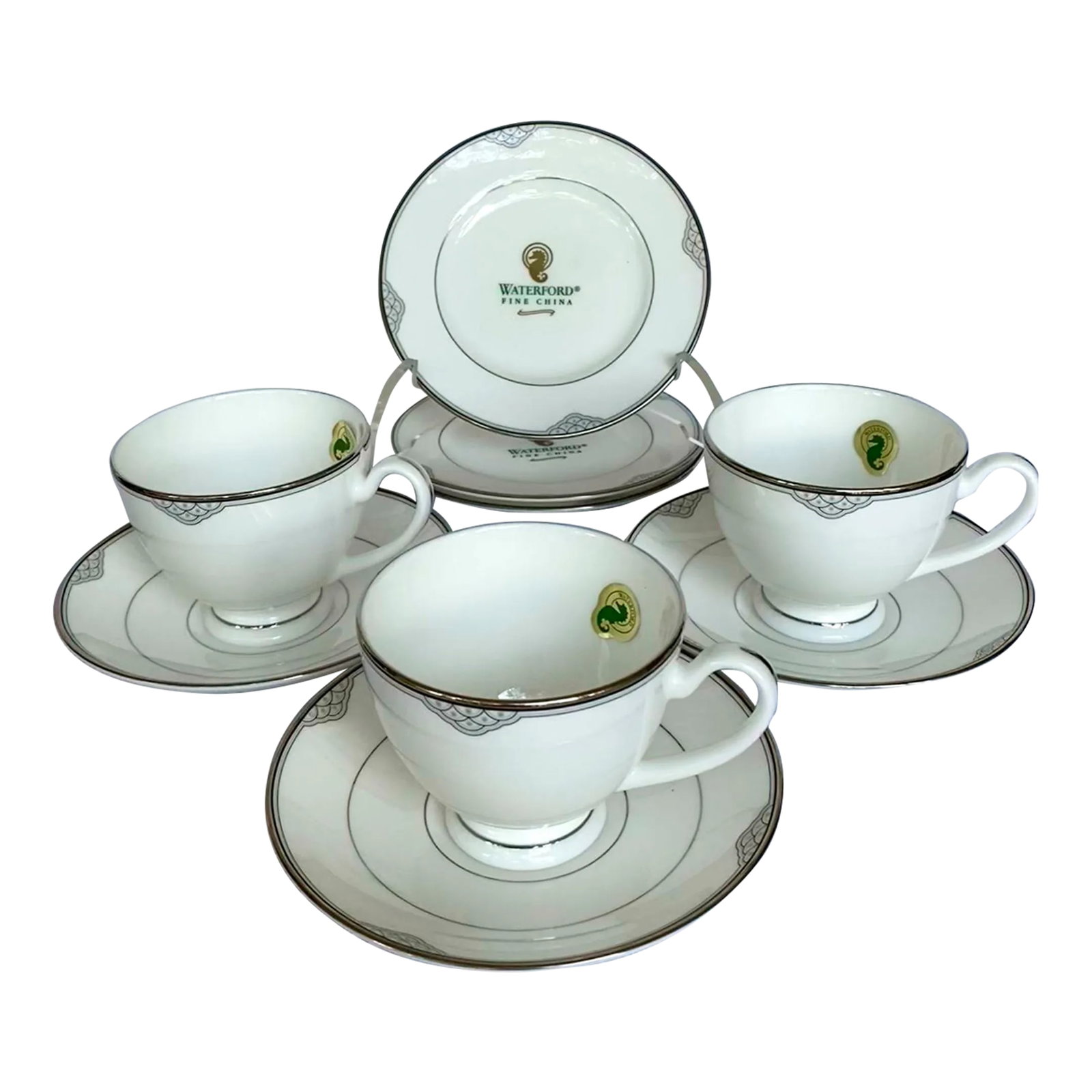 2000s Waterford Chiffonier Scallops & Dots, Platinum Trim Fine China Dessert Serving Set- 9 Pieces: Waterford Crystal was founded in 1783 in Waterford, Ireland, and it has a long history of producing exquisite tableware and glassware. The Waterford Chiffonier Dinnerware is considered a luxury