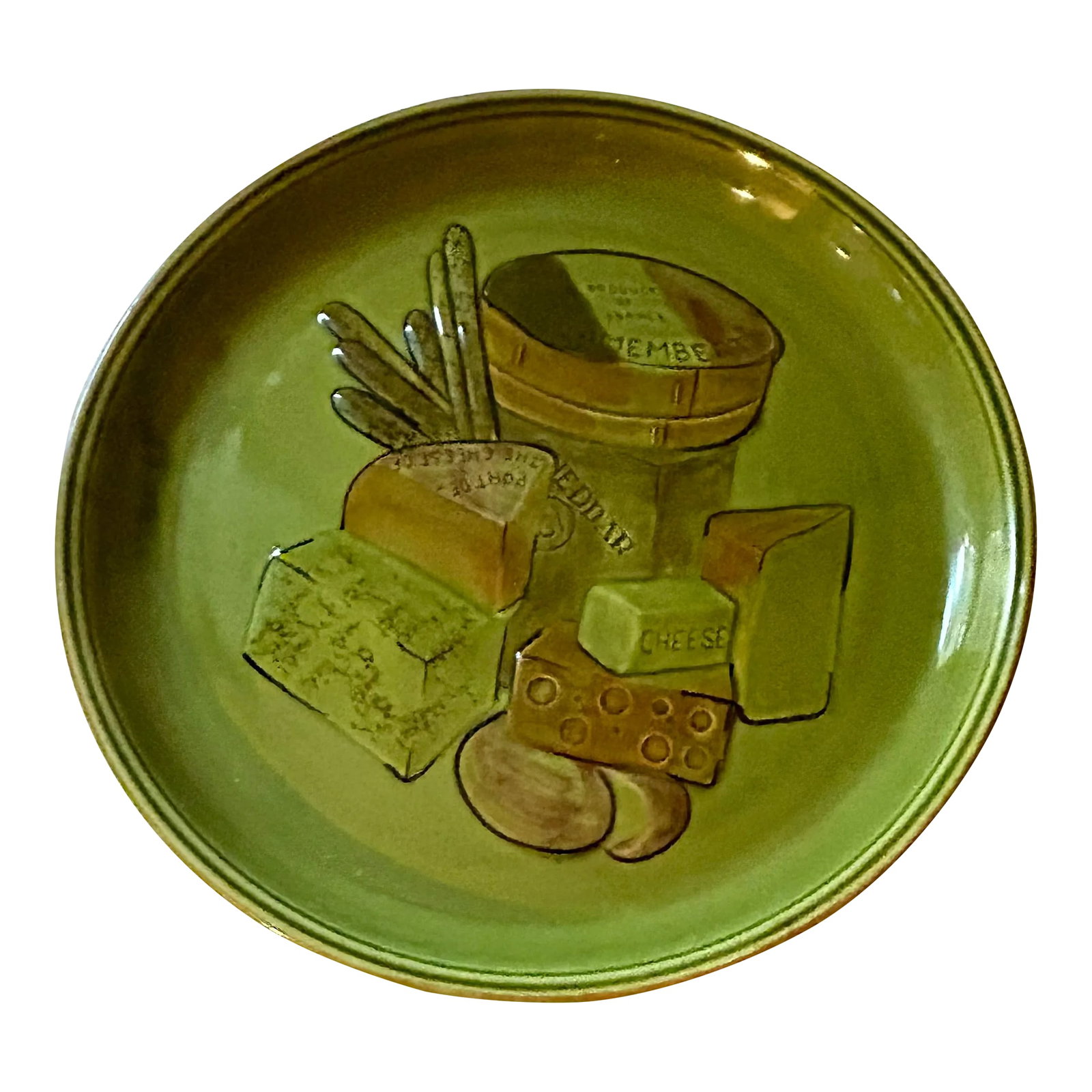 1960 Green French Cheese and Bread Round Plate Serving Platters by Los Angeles Potteries: Chic Avocado green 14" round platter depicting 4 French cheeses and bread by California based Los Angeles Potteries. Makers Mark on the bottom of platter: Los Angeles Potteries 505 USA Circa 1960's