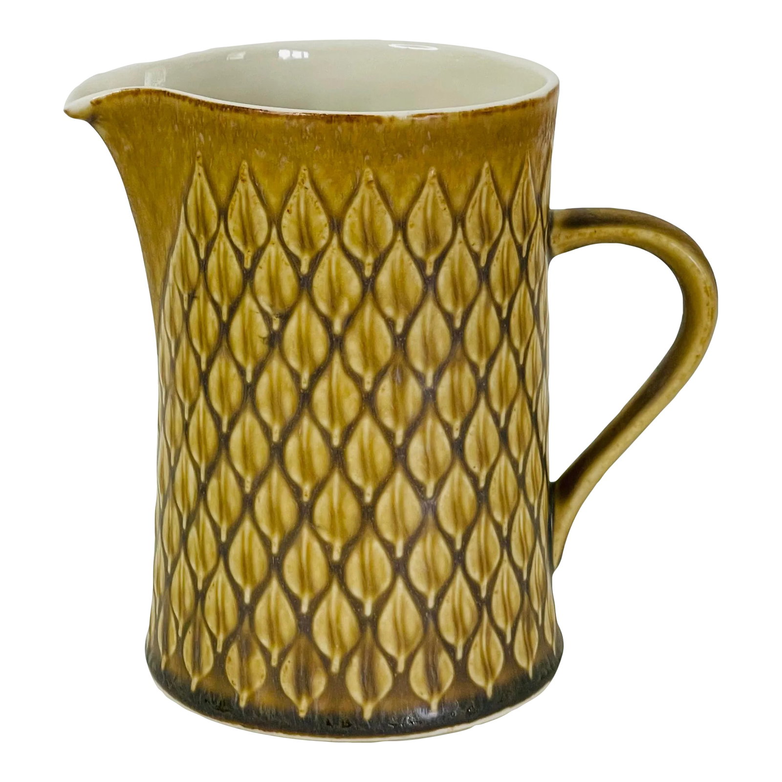1960s Danish Modern Ceramic Relief by Jens Quistgaard Milk Pitcher: Vintage 1960s Danish Modern Ceramic Relief By Jens Quistgaard Milk Pitcher. The pitcher was manufactured by Bing & Grondahl and designed by Jens Quistgaard but is unmarked. In excellent condition, no