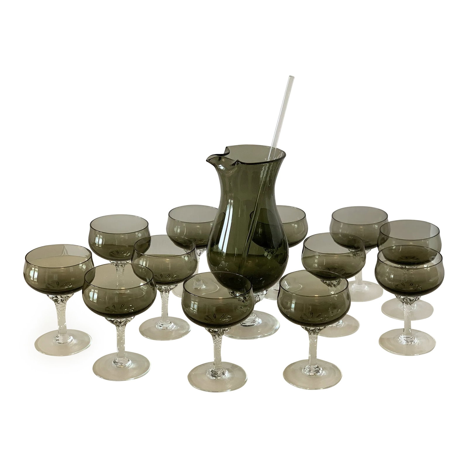 Vintage Pitcher With Stirrer and 12 Stem Glasses: Get your summer backyard party going with a pitcher of Margaritas, Sangria, or Martinis....dare I say...stirred, not shaken. Handblown and substantial. Not the type of thin pieces that you find these
