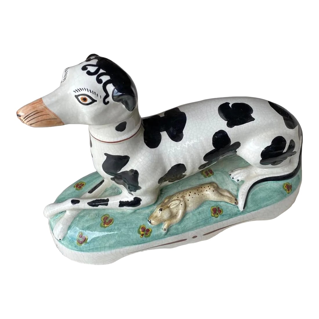 1990s Black and White Staffordshire-Style Dog: Beautifully proportioned Staffordshire-Style Dog Statue made in Italy in the 1990's. Big enough to fill up some shelving in a bookcase or Hutch. Also looks wonderful perched atop a stack of coffee