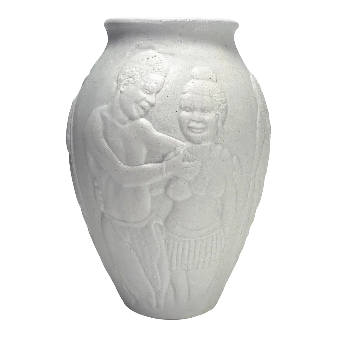1990s Douglas Lentsa White Embossed Multi-Scene Studio Pottery Vase, South Africa: Standing at a height of 6 inches and spanning a length of 4 inches, this pottery masterpiece stands as a testament to both skill and creativity. Its remarkable condition, devoid of any chips, cracks, 