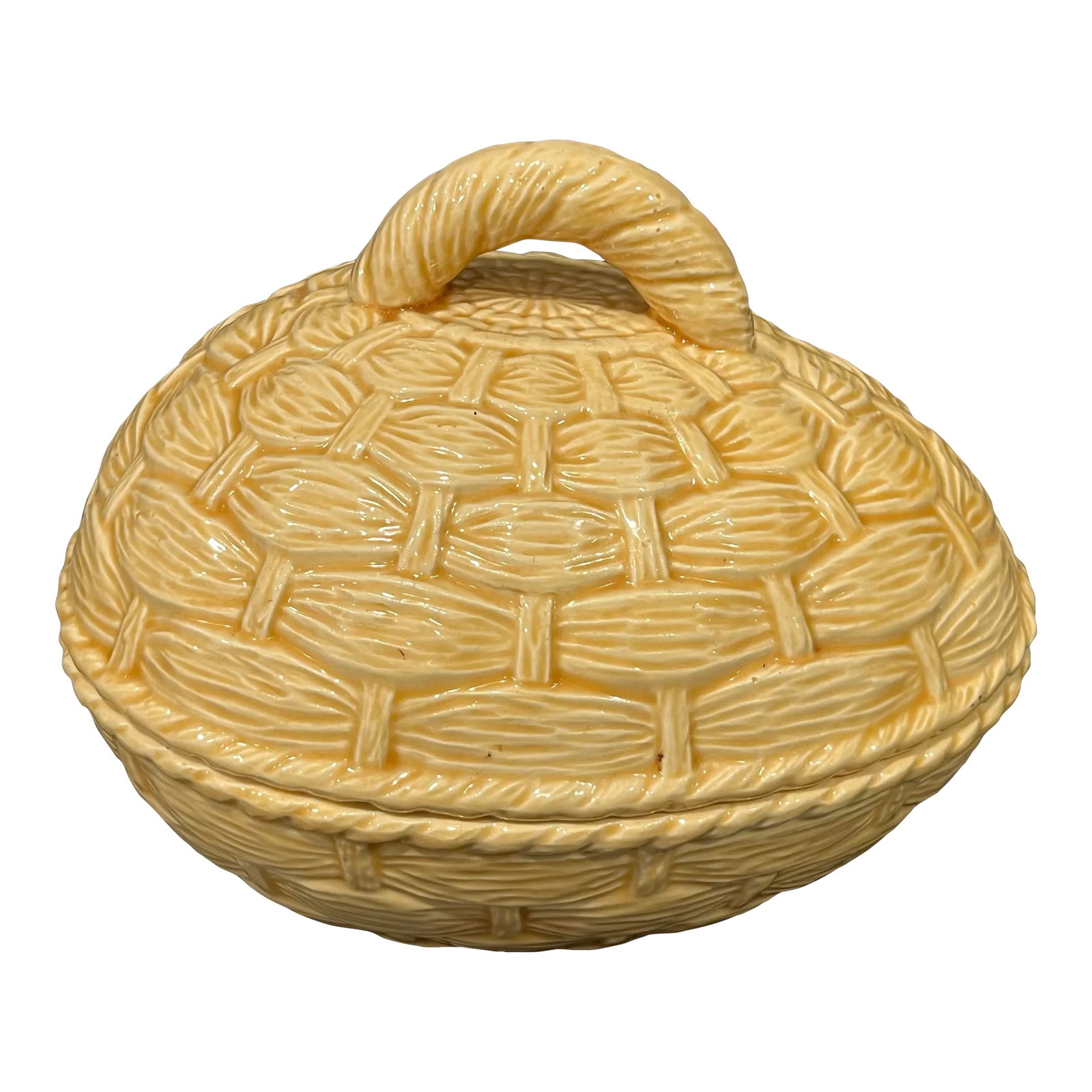 Vintage Egg-Shaped Covered Dish: A basket wave design adds charm to this handled, egg-shaped covered dish. Perfect for your Easter table or anytime. It is a soft brownish yellow or ecru color. Condition: Alterations: Original