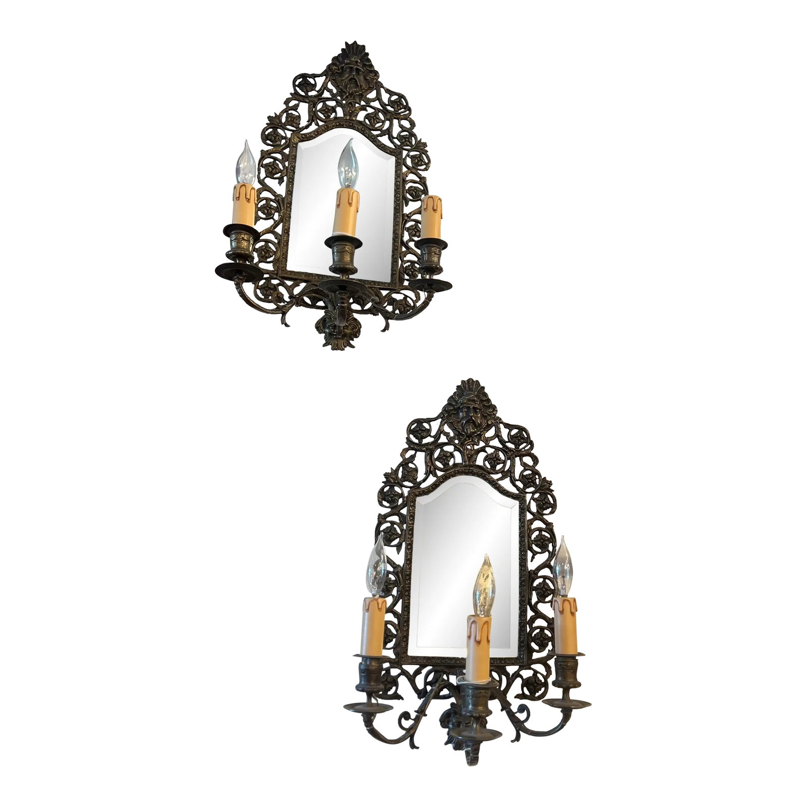 Pair of Late 19th Century American Gilt Bronze & Beveled Mirror Wall Sconces: From the late 19th century pair of American Gilt bronze and beveled mirror Sconces. Originally candle, now rewired and ready for a new home. Tripple candelabra base sockets with antique candle covers.