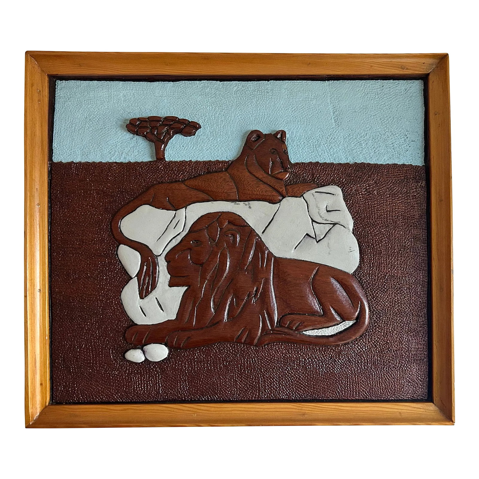 1970s Carved Wood Framed Lion Relief: Hand carved wood depiction of two lions in landscape. Beautiful two-tone wood frame. Signed Alfred Santoro, 77'. Condition: Alterations: Original Condition Unaltered Imperfections: Some Imperfections