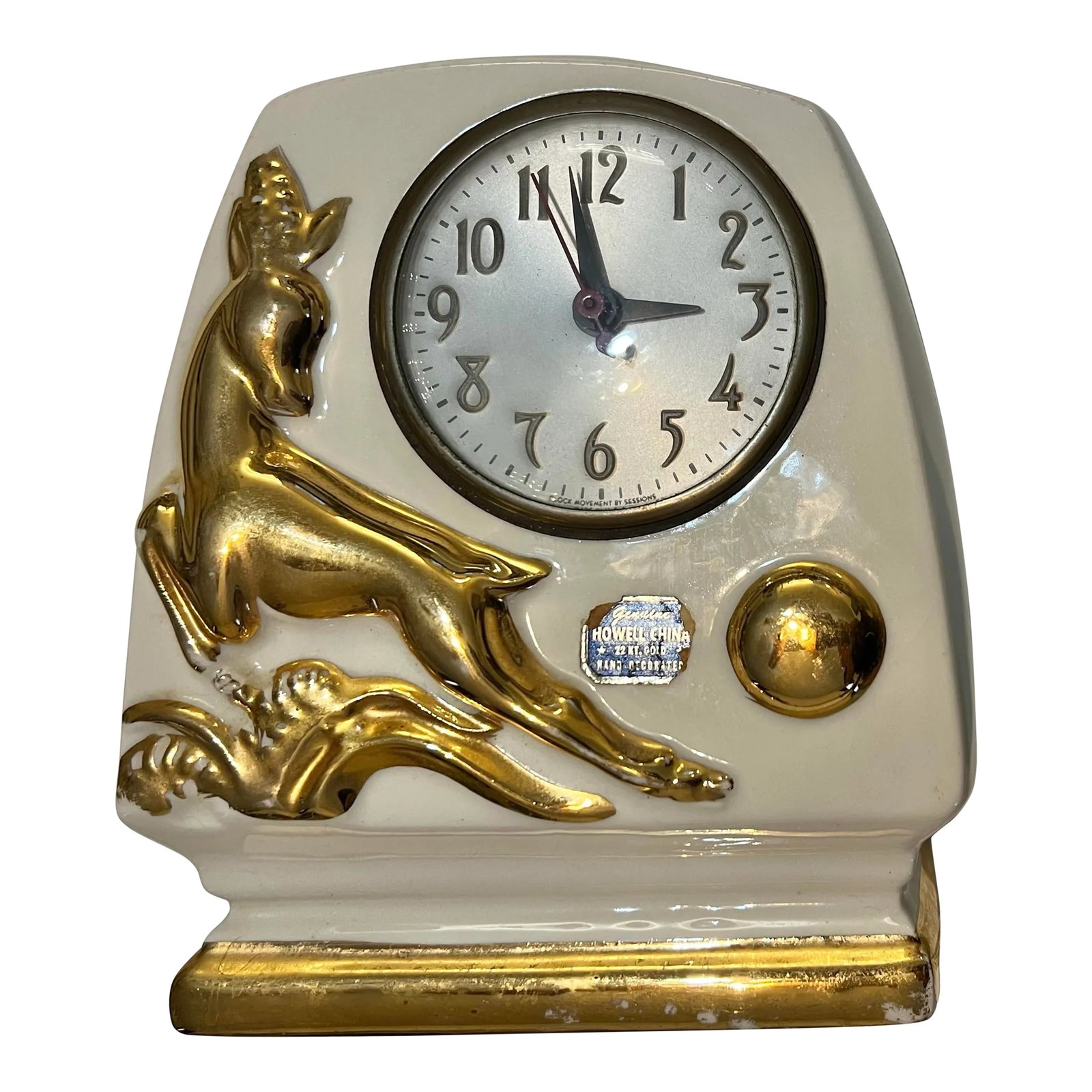 Vintage 1940 Deer Mantle Clock Genuine Howell Co. China 22 Kt. Gold: RARE Vintage 1940 Deer Mantle Clock by Howell Co. China 22 kt. Gold. This is such a unique piece! A gorgeous ceramic clock that features a 22kt Gold Deer or Gazelle jumping over a bush. In a