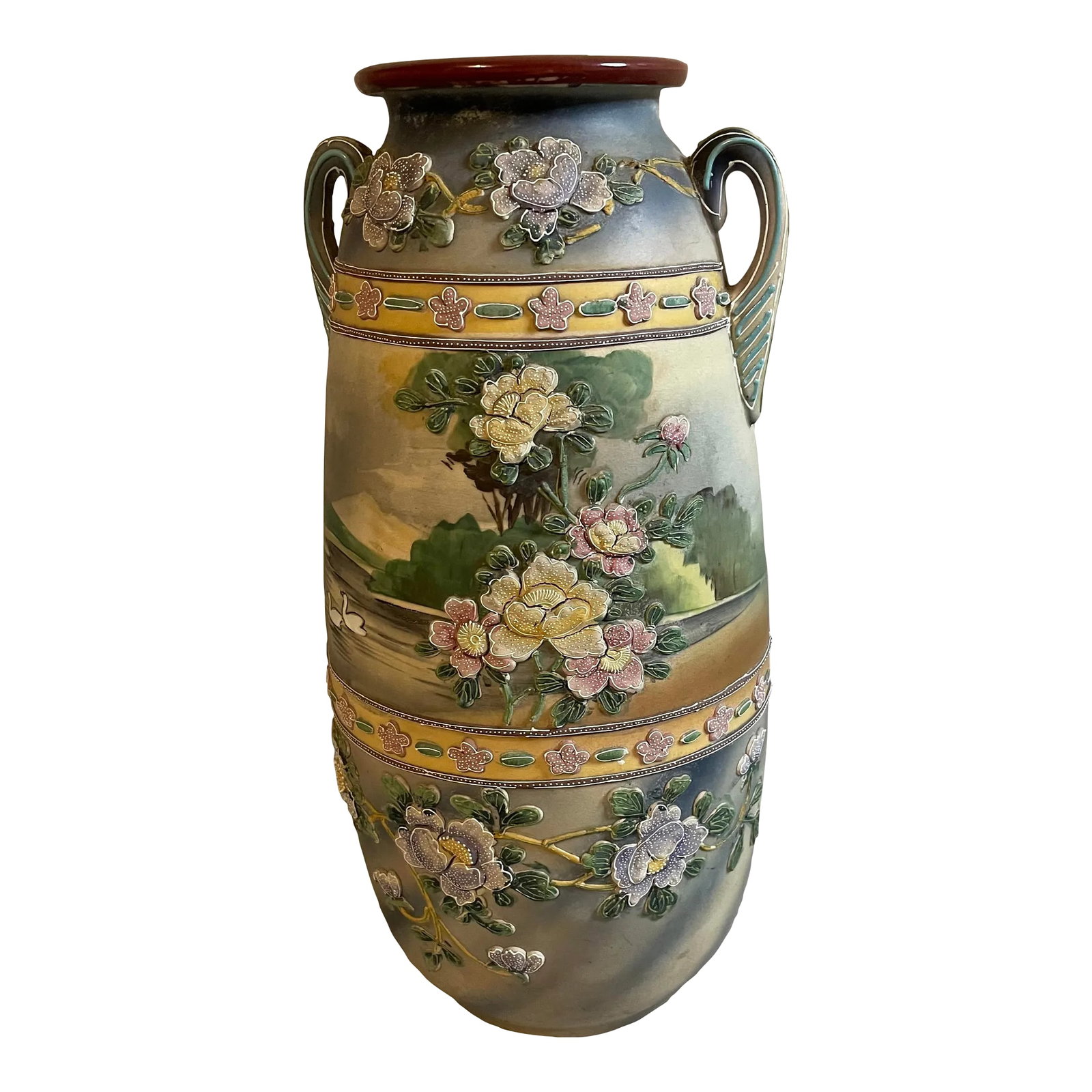 Antique Late 19th Century Japanese Ceramic Vase: A ceramic vase from late 19th century Japan featuring beautiful Japanese flower gardens. Dimensions: 15 in H x 7 in W x 7 in D 3.5 in opening 5 in base Condition: Alterations: Original Condition