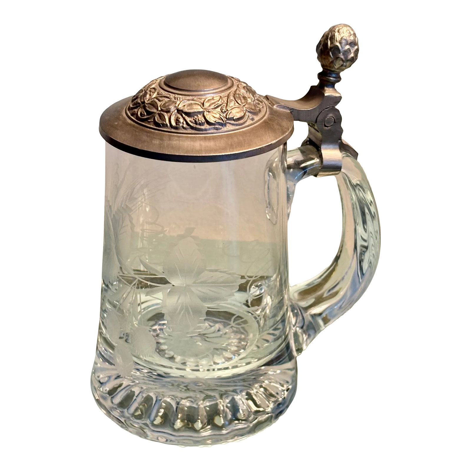 Vintage German Etched Glass Beer Tankard With Design Relief Metal Lid: Beautiful German workmanship on this 70s beer vessel. The glass depicts, etched in glass, leaves and flowers of the hops plant. The tankard lid has wonderful scroll work with a hop flower finial. The