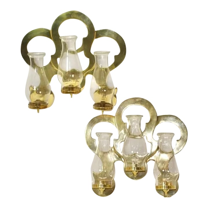 1970s Sarreid Brass 3 Candle Wall Sconce: Wonderful vintage brass candle wall sconces, each with 3 bright brass rings illuminated by 3 candles, each with a clear glass globe. Chimney globes are not original. Condition: very good+ vintage cond