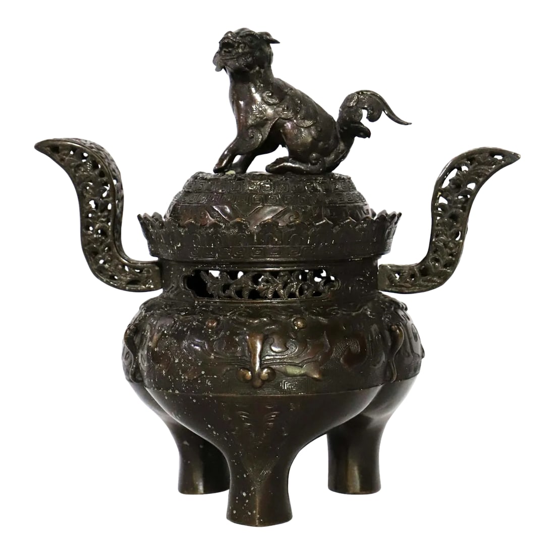 Antique Bronze Chinese Foo Dog Incense Burner: Antique Chinese cast bronze censer or incense burner has a cover with a temple lion or Foo Dog sculpture handle, 19th c. Bronze with beautiful pierced and relief detailing and original rich deep