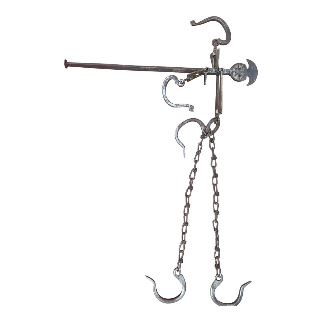 Antique Greek Decorative Butcher's Steelyard Weighing Instrument: Greek Decorative Butcher's Steelyard Weighing Instrument with two hooks. One hook raises up to attach to a holder and the other is down. A weight would slide along the rod to balance the weight on