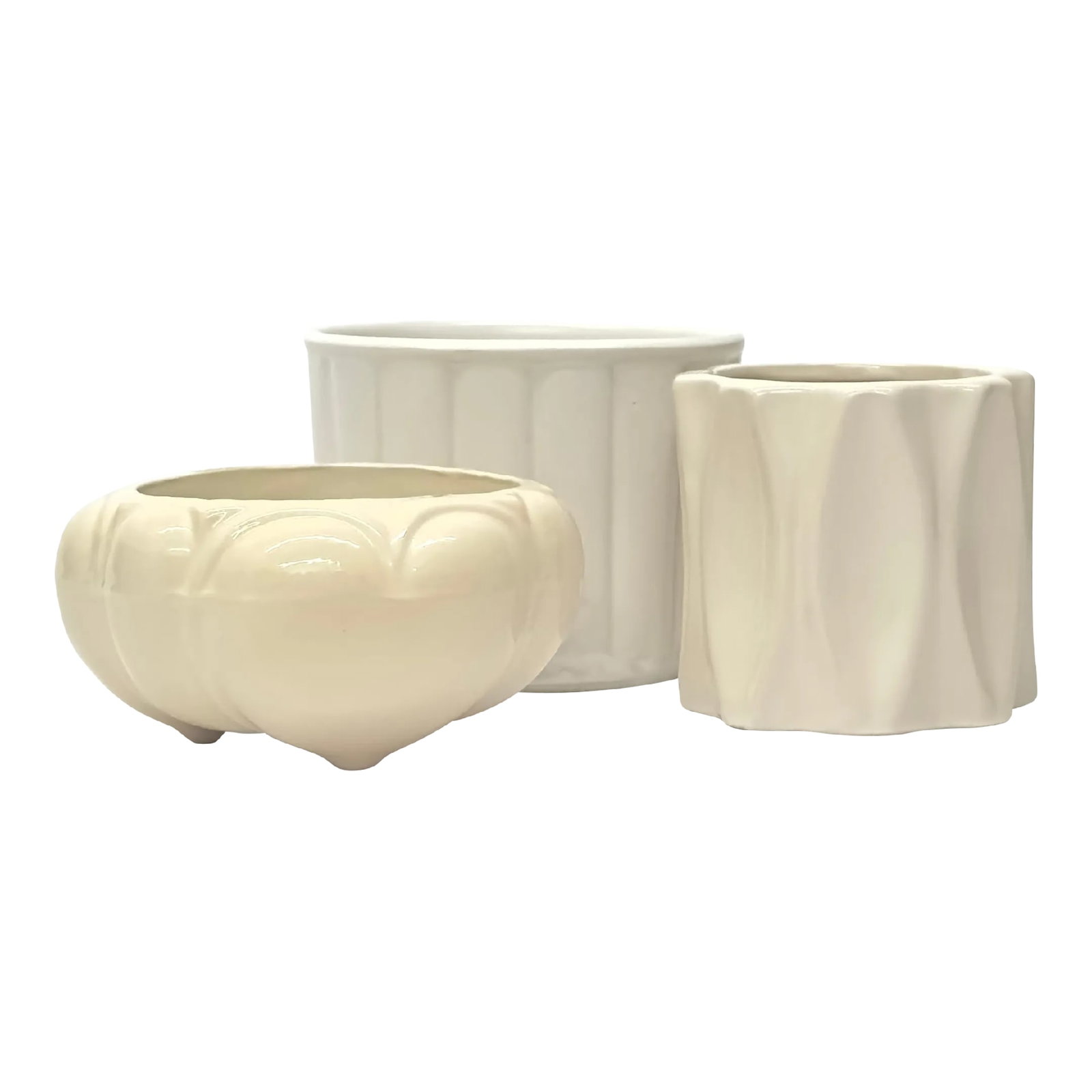 Vintage Warm-White Textured Planters - Group of 3: White ceramic planters, group of 3. This set of art deco planters are in a cream or antique white color, featuring a variety of shapes and sizes. Shortest: 3"H Tallest: 3.75"H Condition: Alterations: