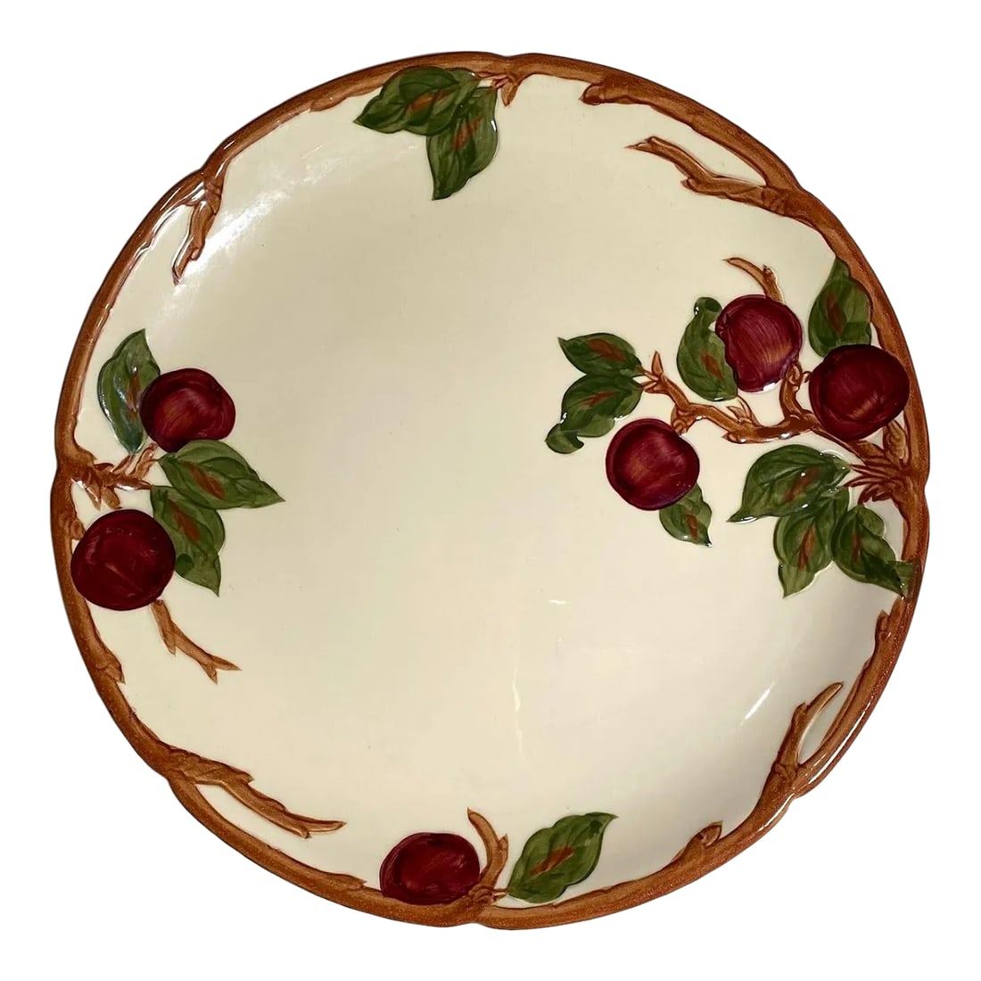 Franciscan Apple Round Platter (Chop Plate) - Red Apples & Green Leaves, Brown Scallop Trim, Usa Bac: Introduced in 1940, Franciscan Apple is a beautiful earthenware pattern featuring hand-painted designs that reflect the beauty of California's apple orchards. The platter features a delightful