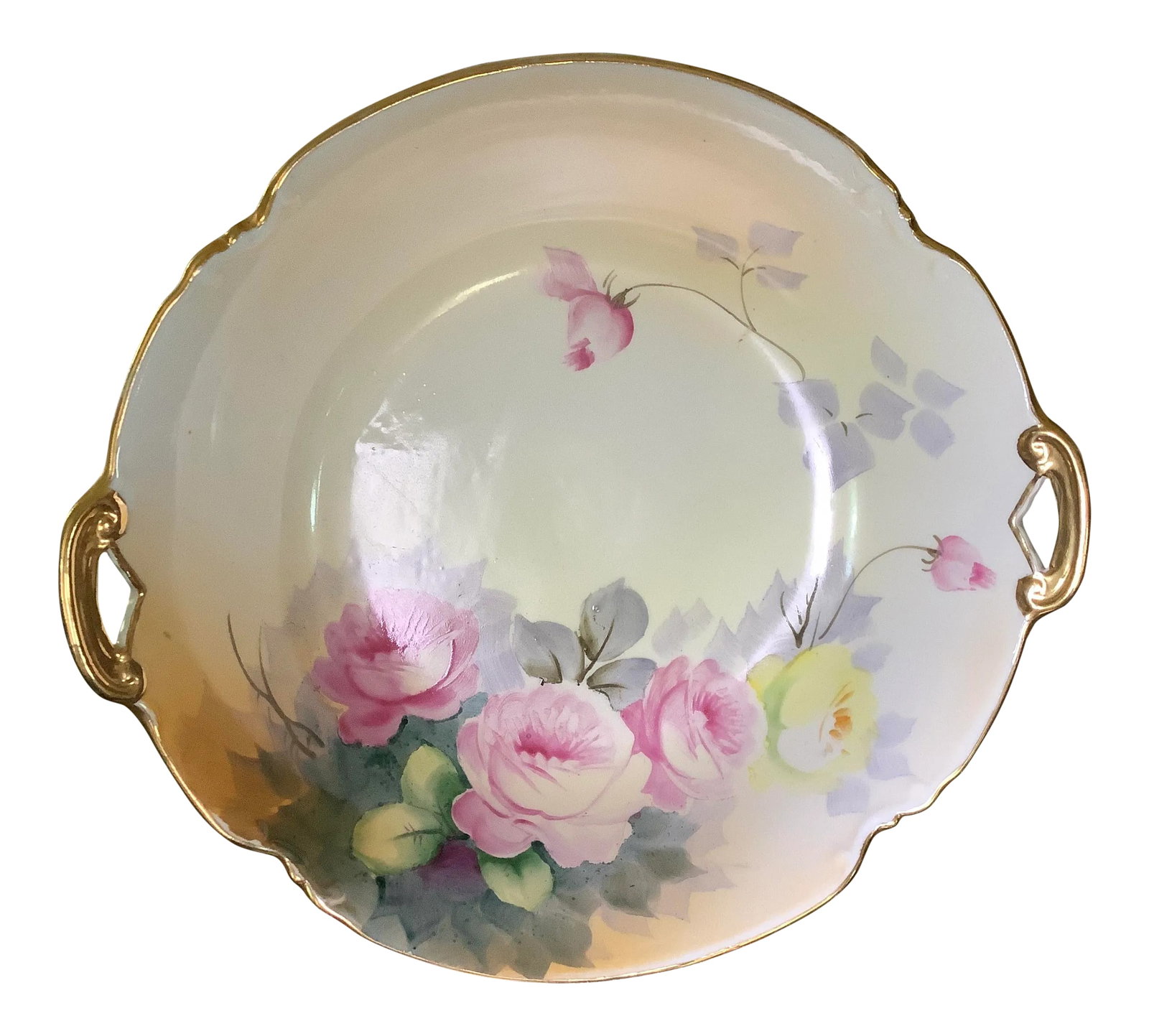 Hand Painted Nippon Centerpiece Bowl: Stunning Nippon centerpiece bowl. A truly beautiful piece of art featuring two gilted pierced handles and hand painted with cabbage roses. Underside marked Nippon Hand painted with the blue leaf,